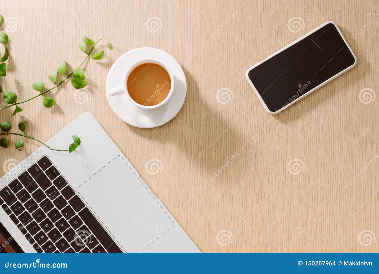 trendy feminine home office workspace. white office desk. laptop, coffee cup and phone, notebook, pencil. flat lay, top view, copy