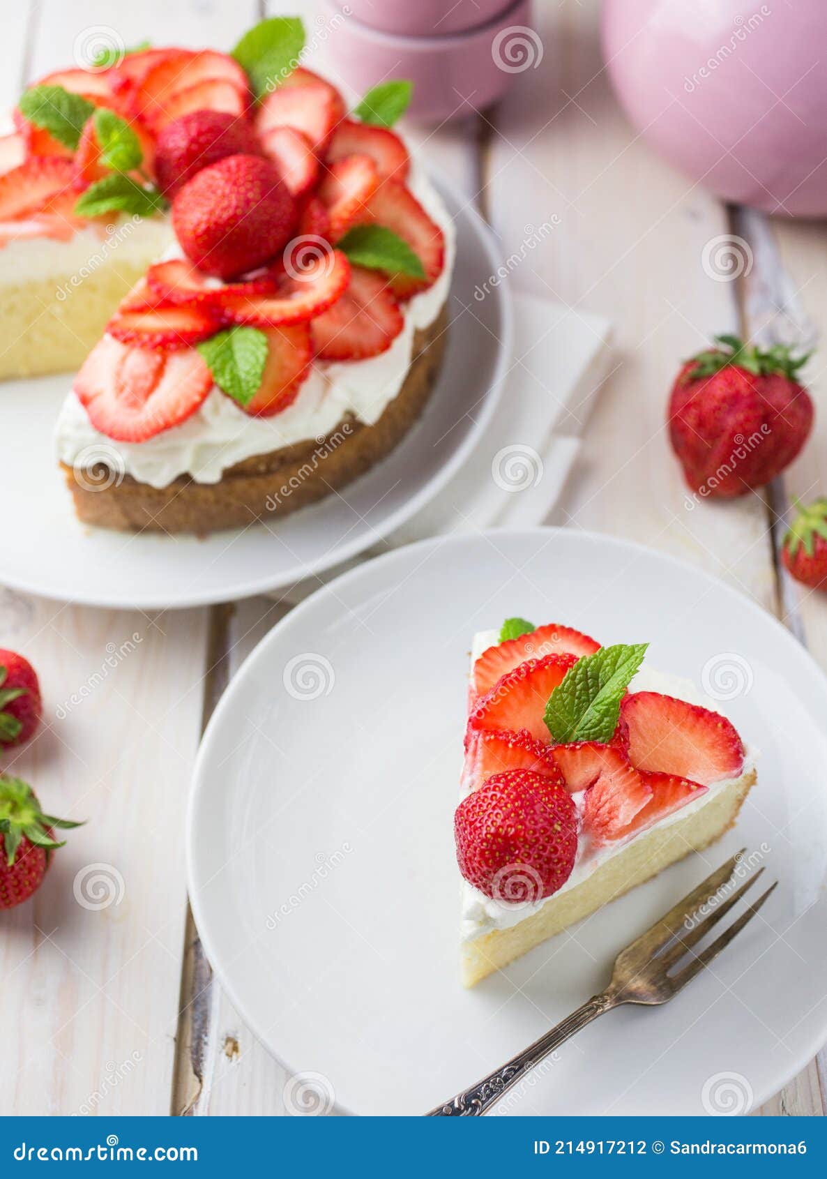 mexican soaked cake topped with strawberries and cream