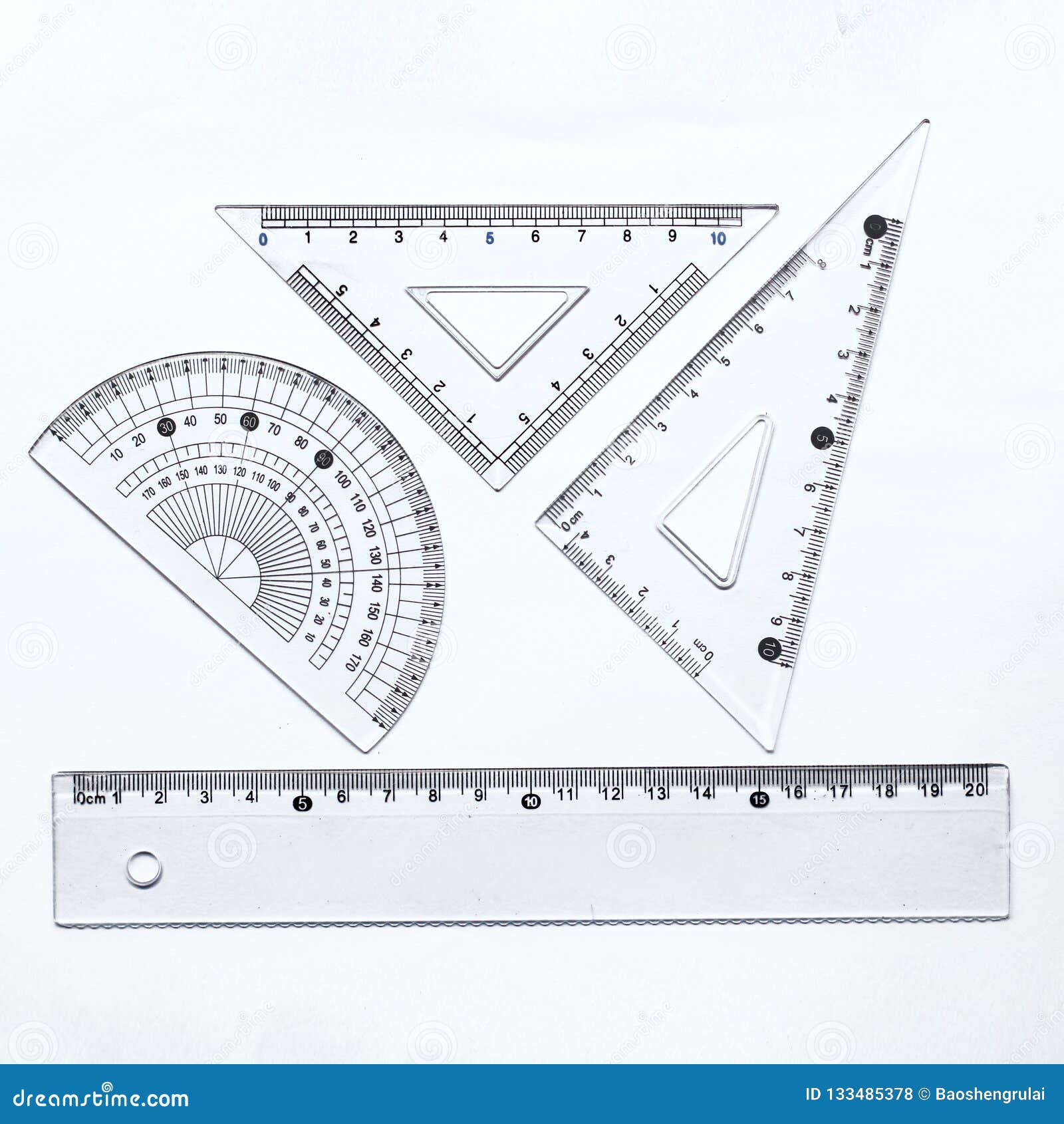 triangle ruler and protractor and ruler set stock photo