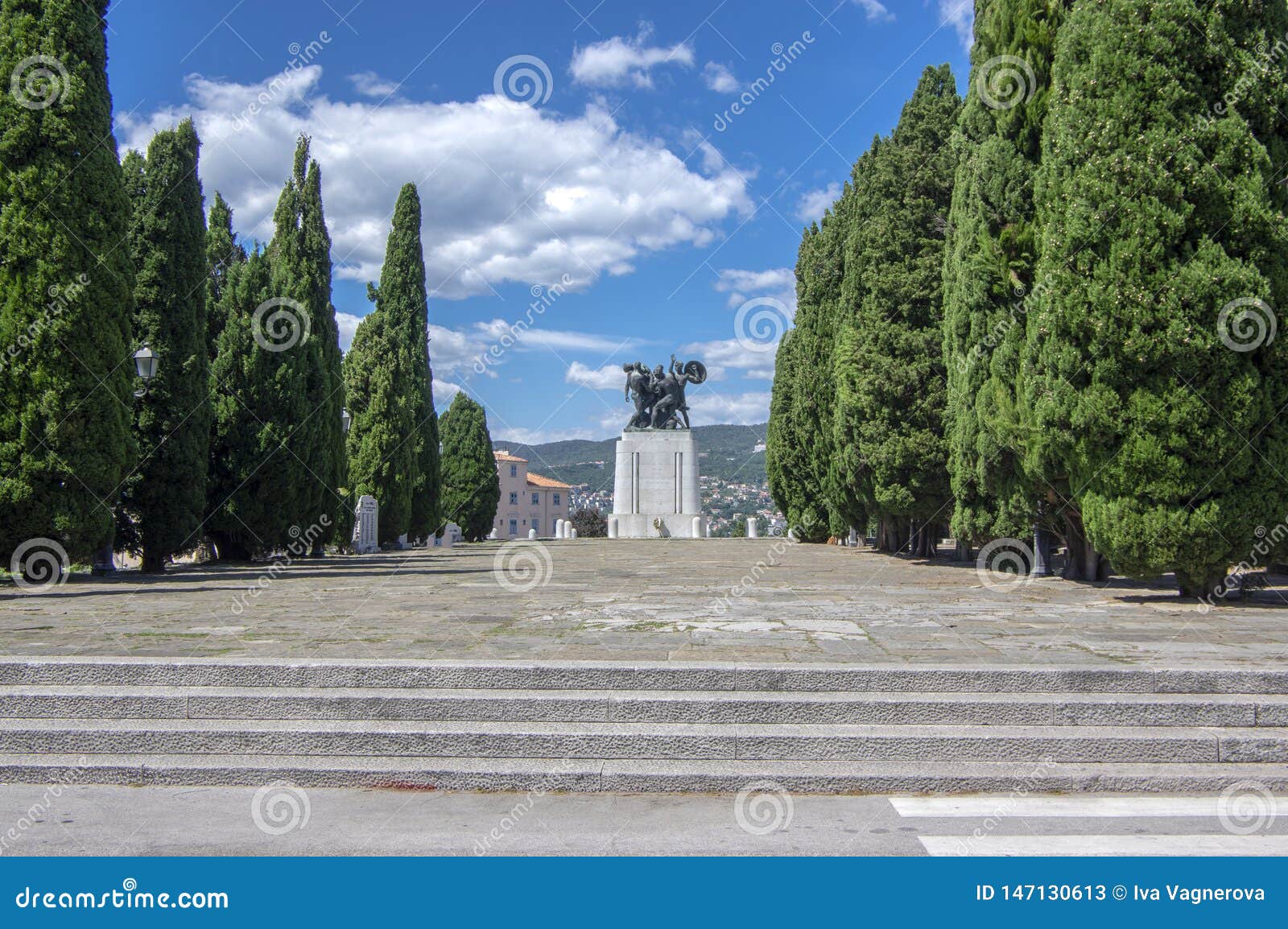 trieste / italy - june 23, 2018: famous statue monumento ai caduti della i guerra mondiale next the castle di san giusto