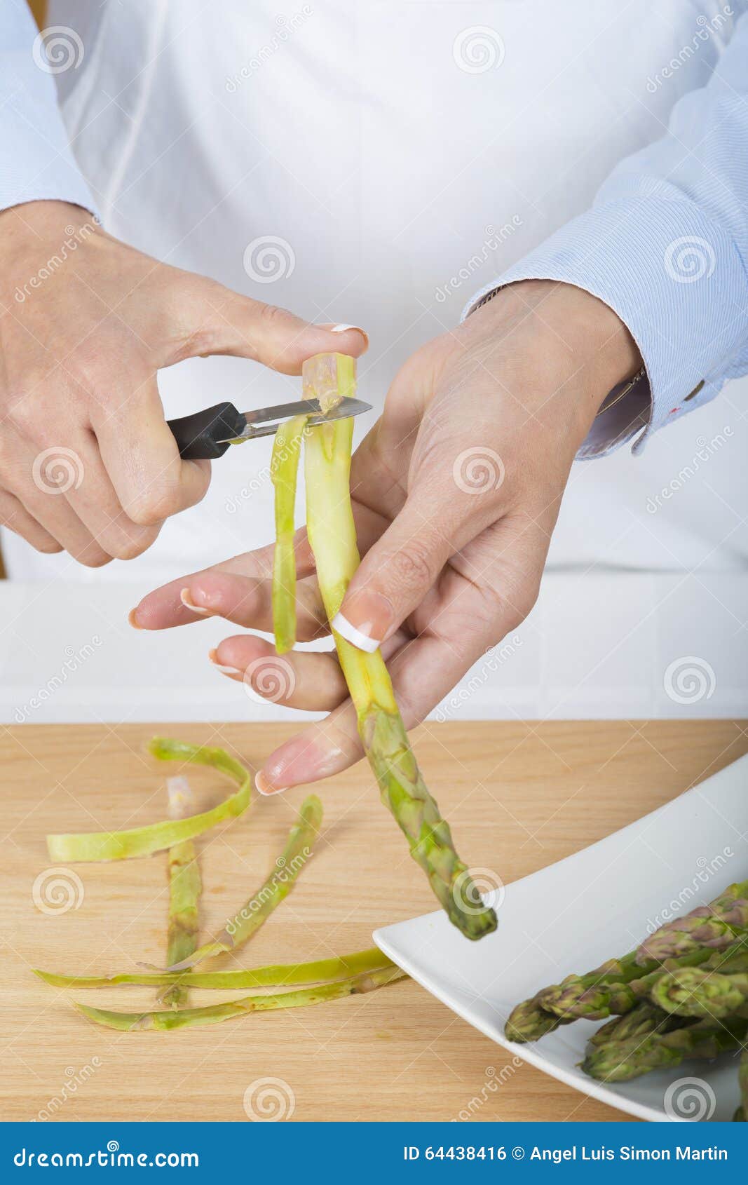 Trim and peel asparagus stock photo. Image of asparagus 64438416