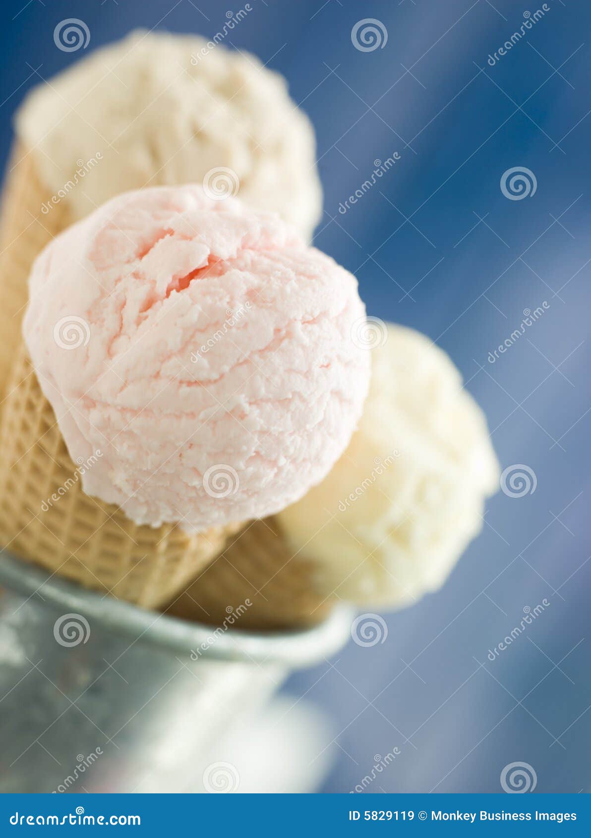 trio of ice creams in wafer cones
