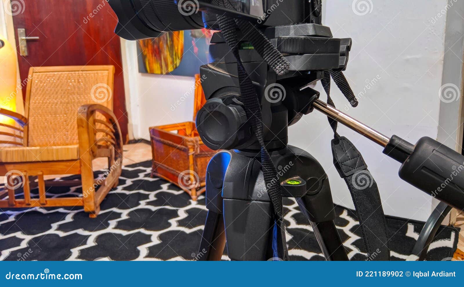 a tripod is used to stabilize the camera when shooting.