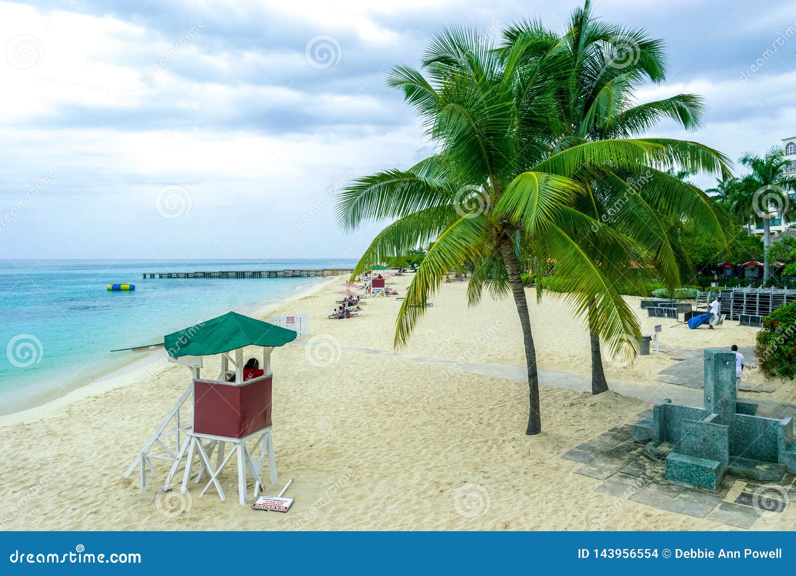 tropical caribbean island white sand summer beach scene.