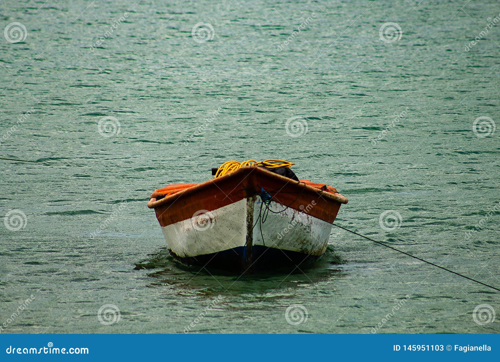 tropical paradise typical scenery: colored wooden boats docked in the sea. miches bay or sabana de la mar lagoon, northern