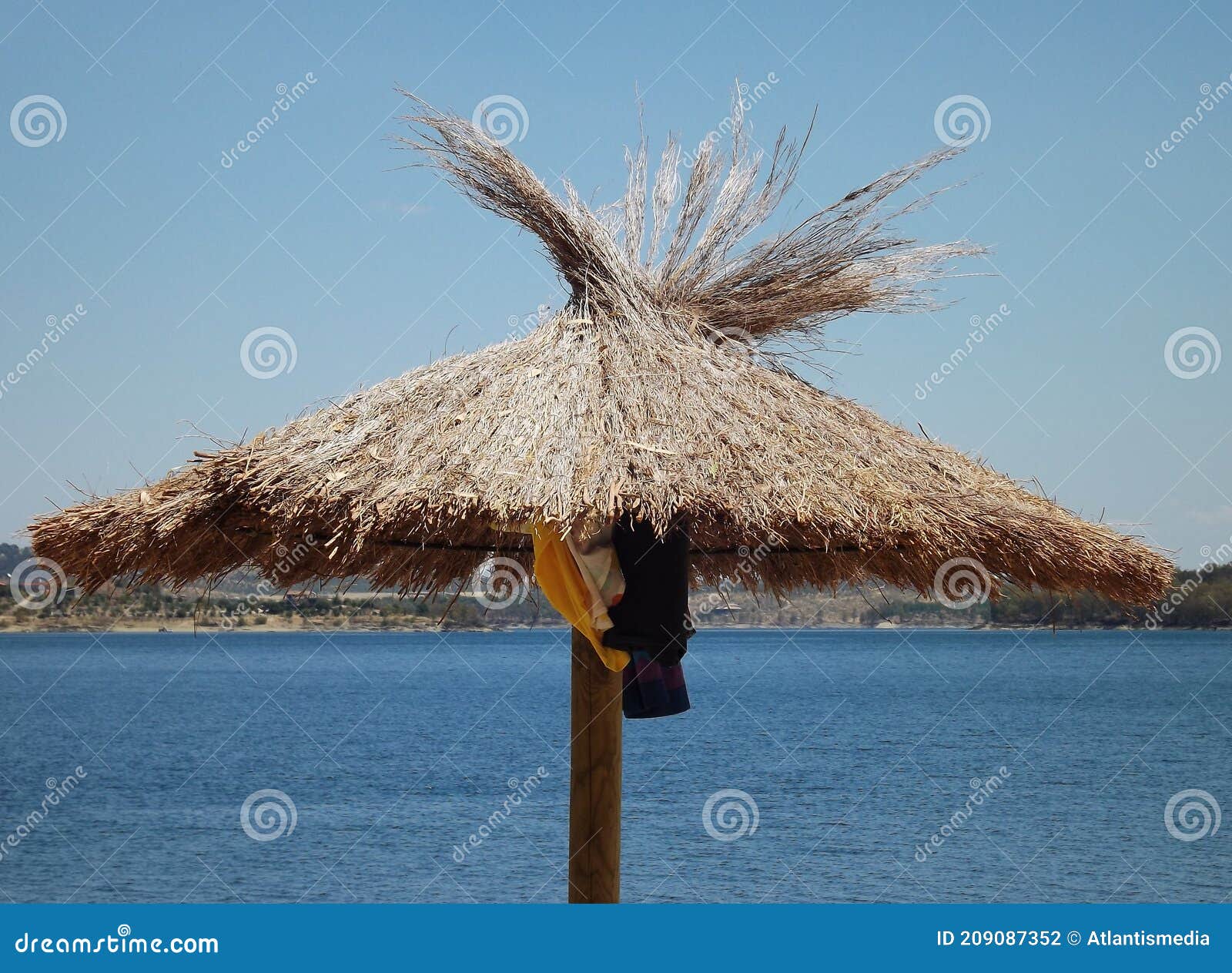 tropical parasols on the orellana dam beach