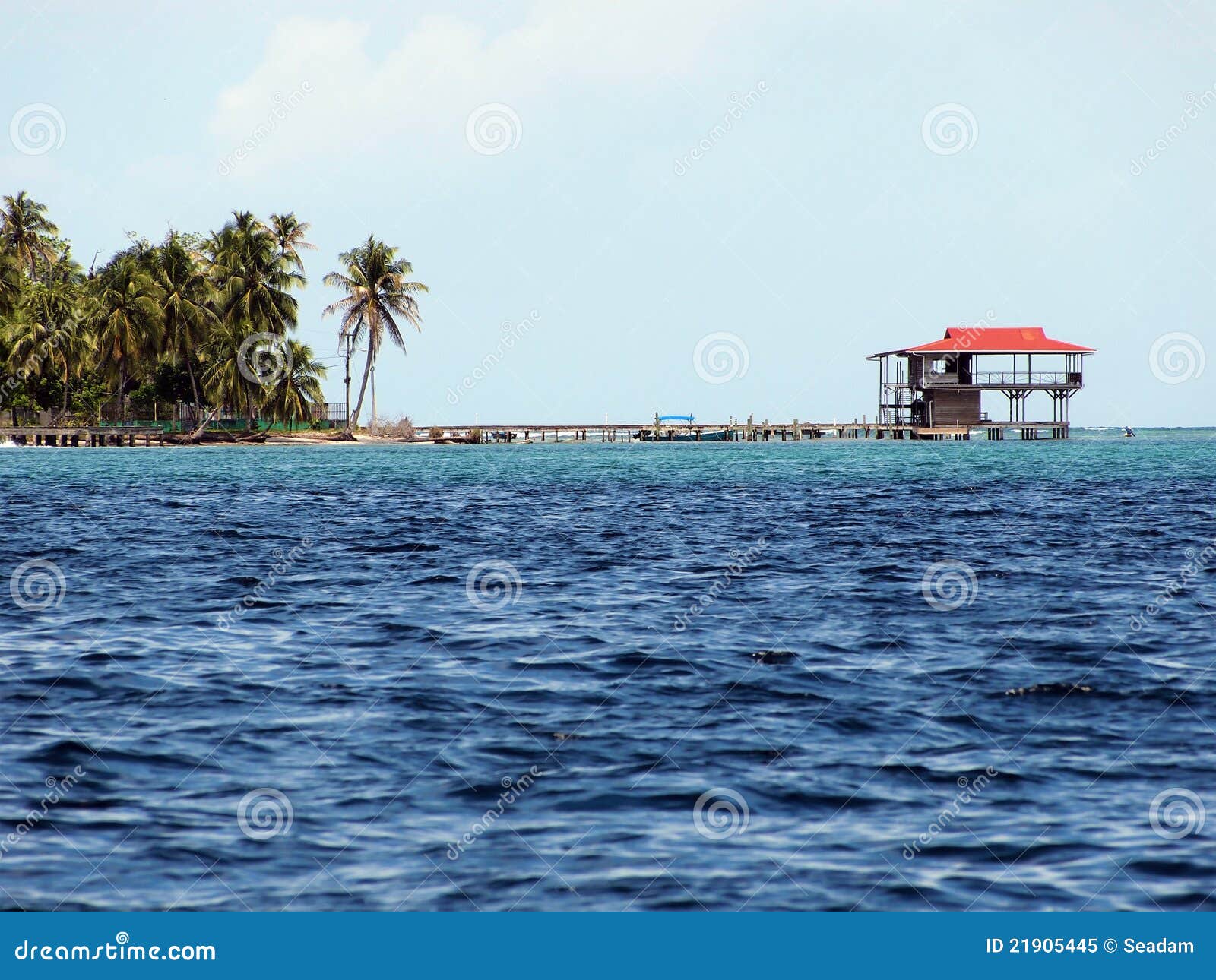 Tropical stilt restaurant stock image. Image of pier - 21905445
