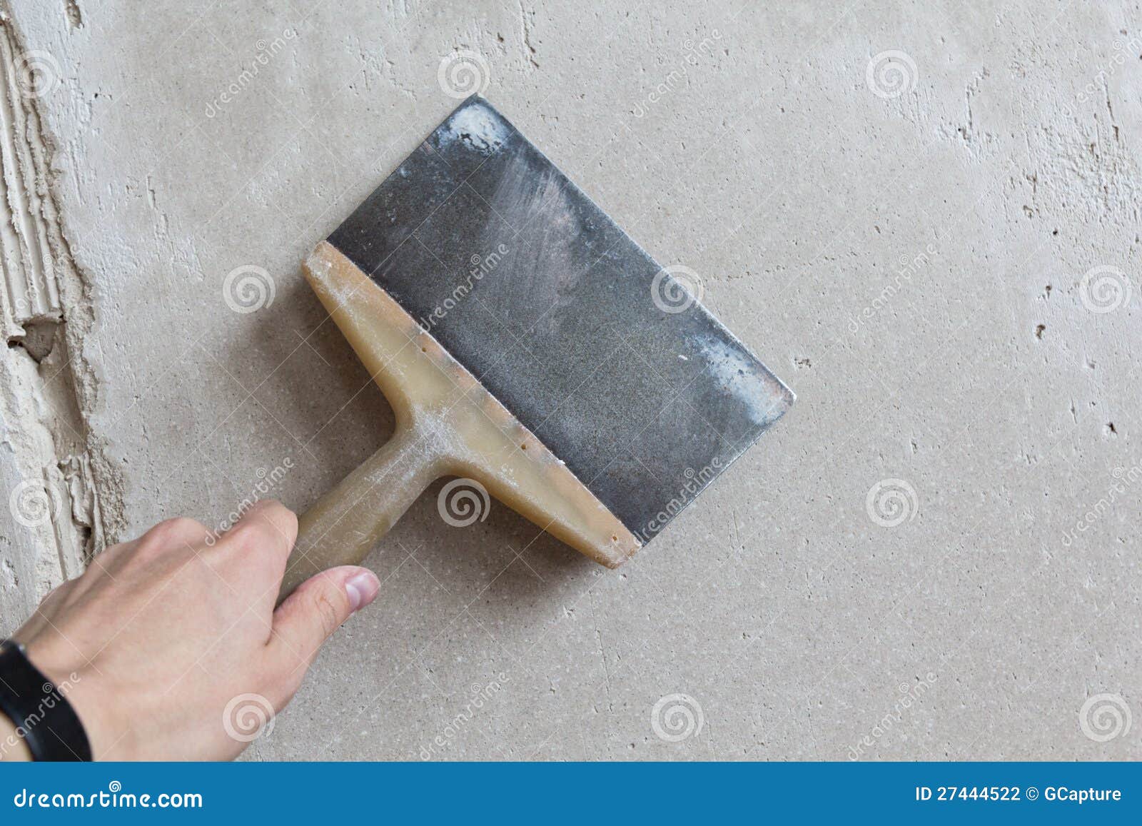 Trowel in a hand stock photo. Image of refit, working 27444522