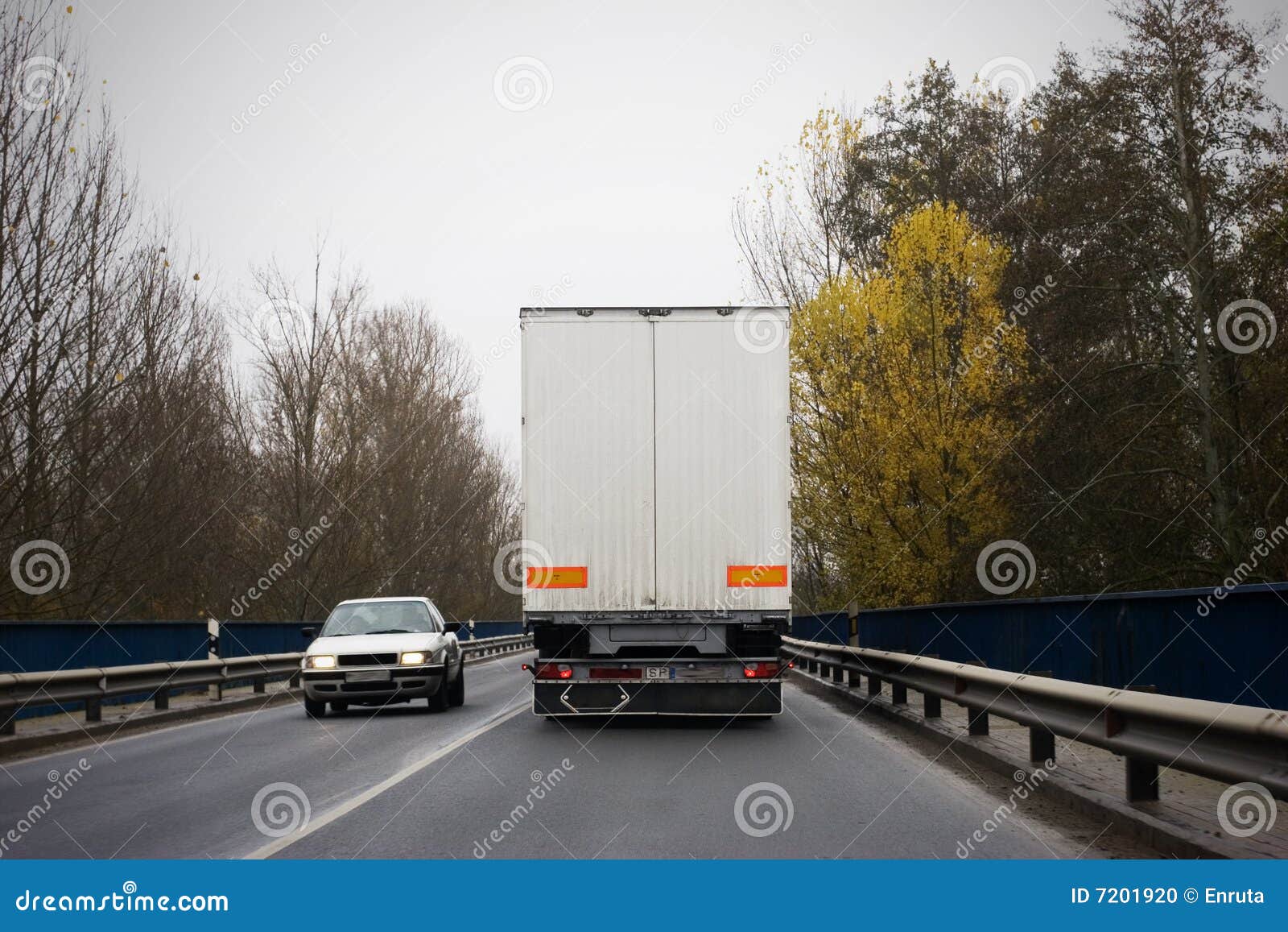 Truck and car on the road stock photo. Image of transport 7201920