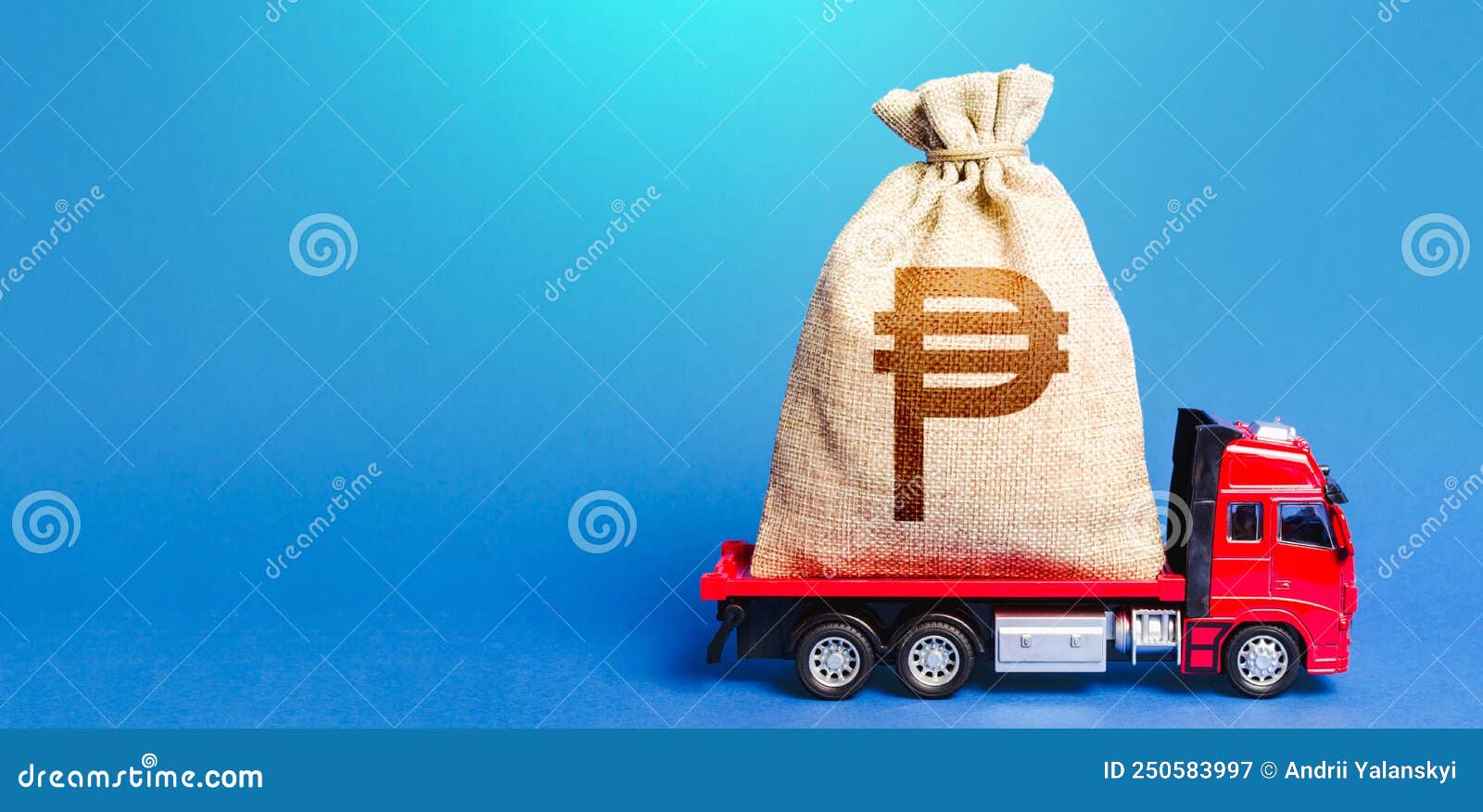 truck is carrying a big philippine peso money bag. investment. anti-crisis measures of government. attracting large funds to the