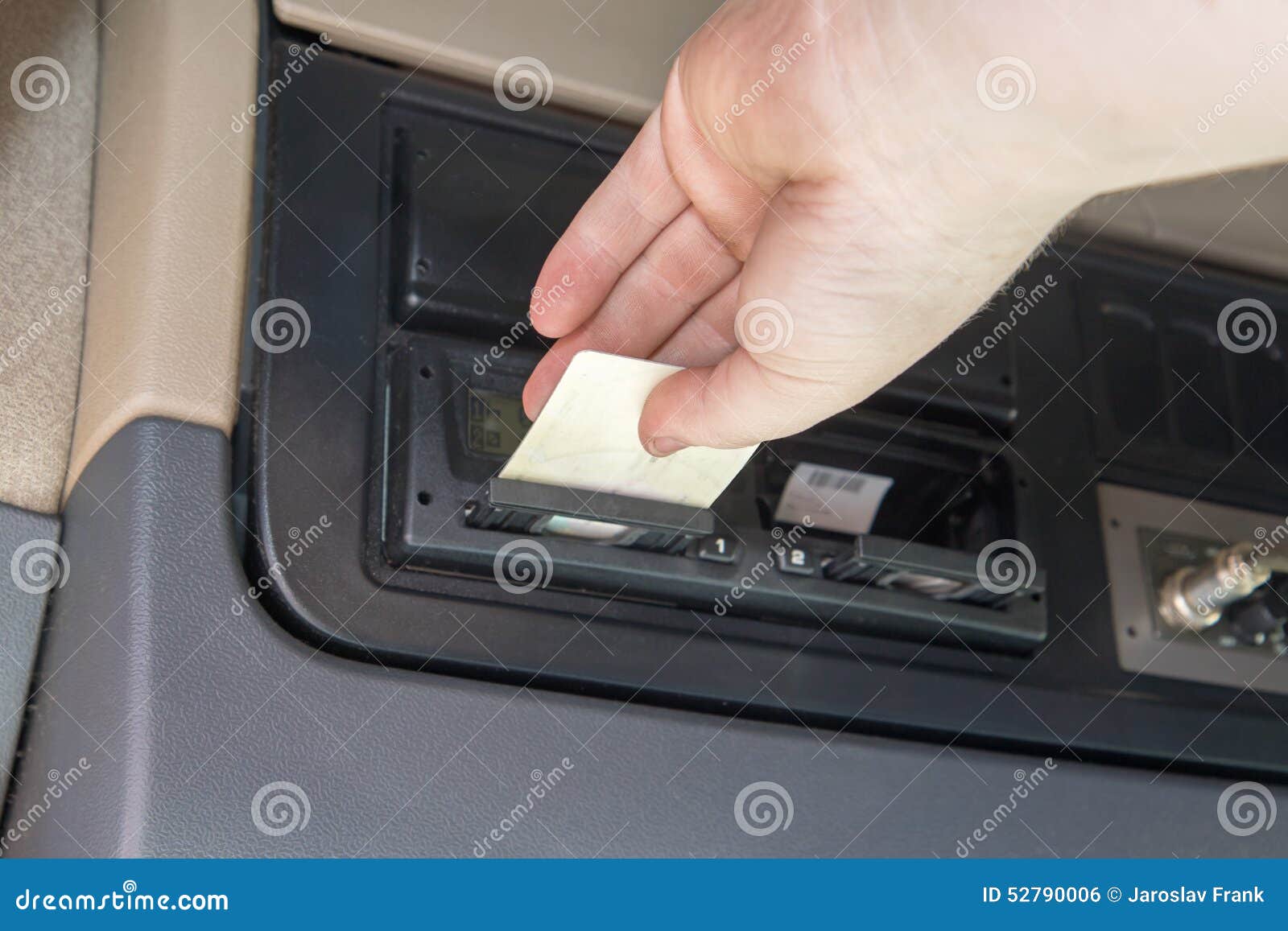 truck driver is using the tachograph card