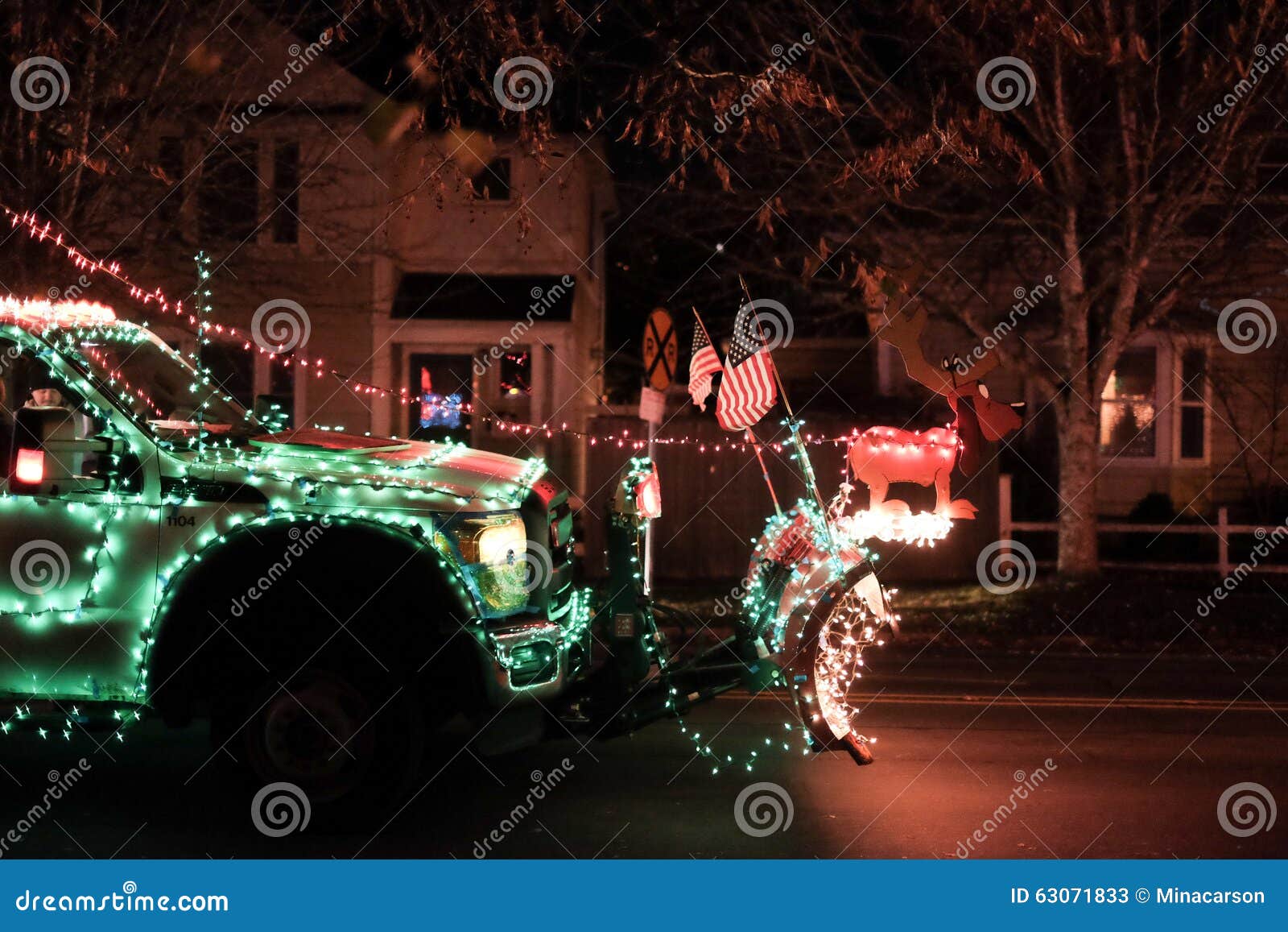 Truck Hood with Grinch Characters and US Flags Prepares for