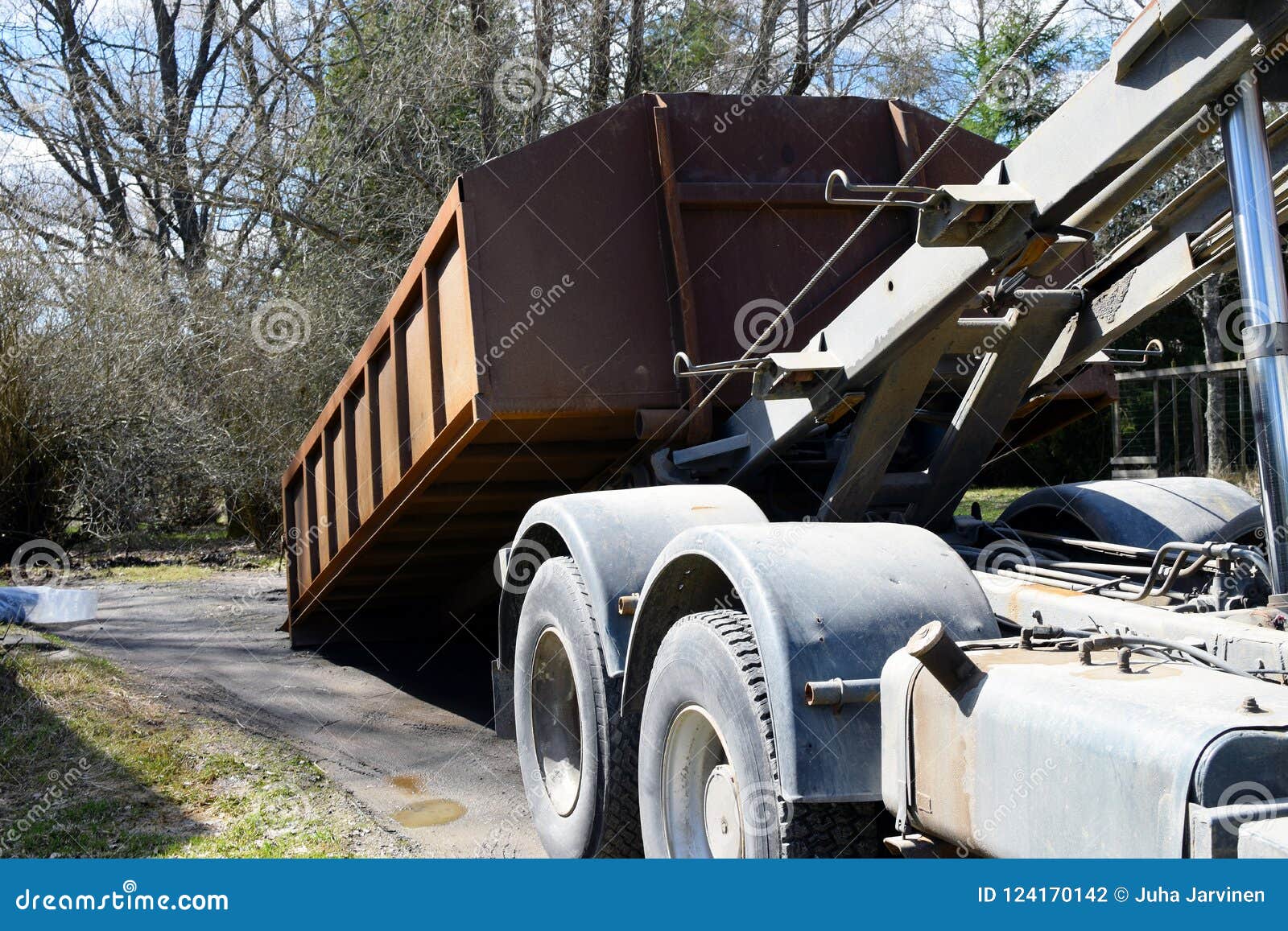 Truck rolloff dumpster stock photo. Image of platform 124170142