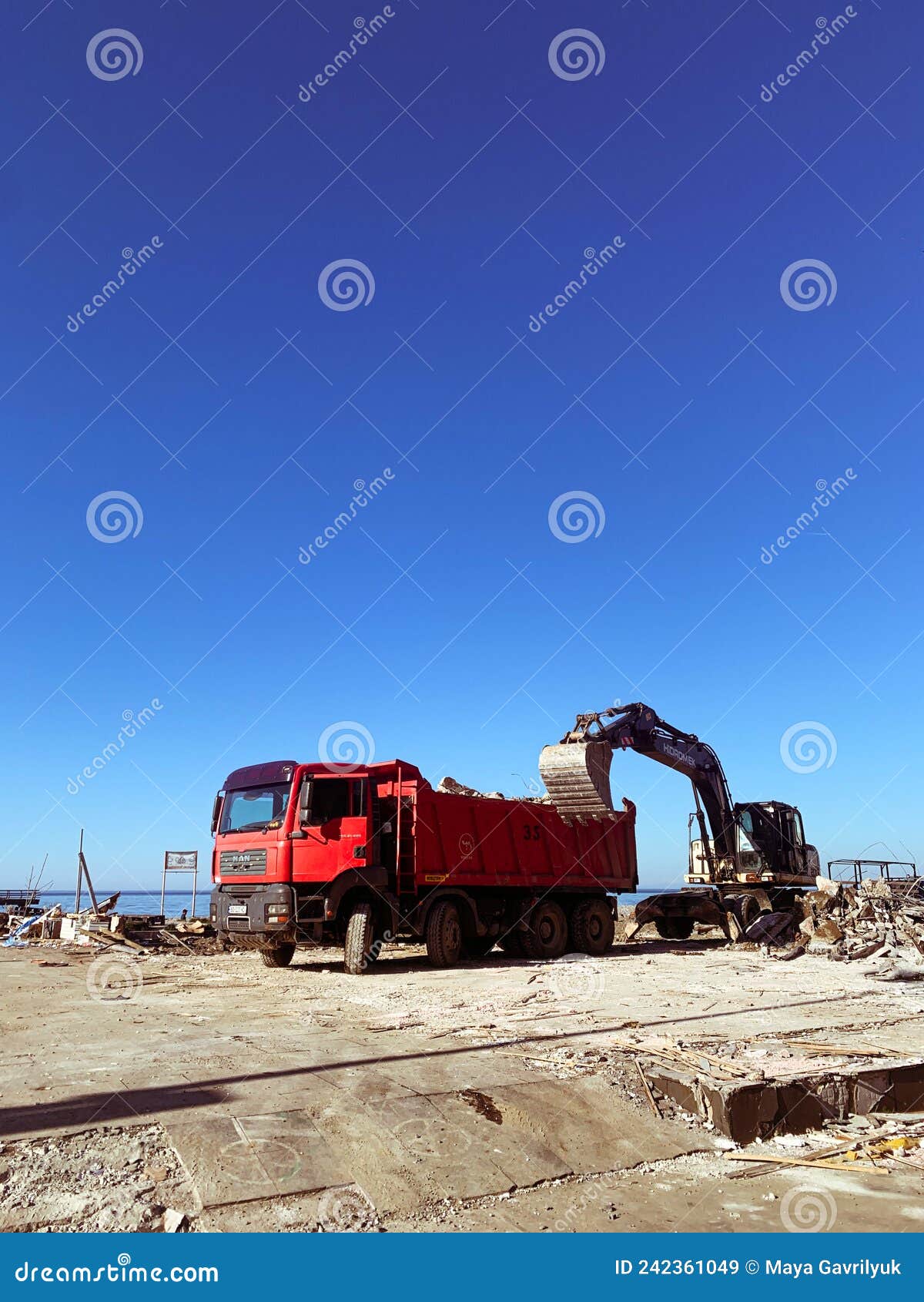 A Truck and a Tractor on a Construction Site Open Air Editorial Stock