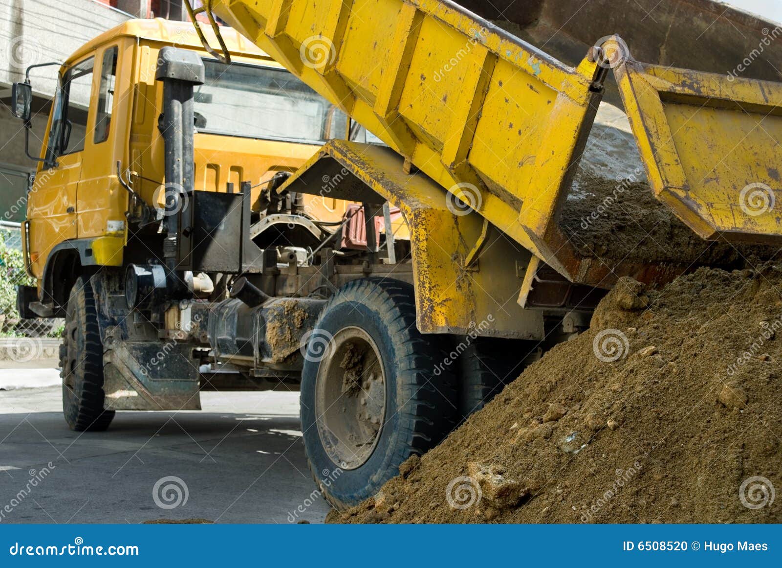 Truck unloading sand stock photo. Image of industry, transportation
