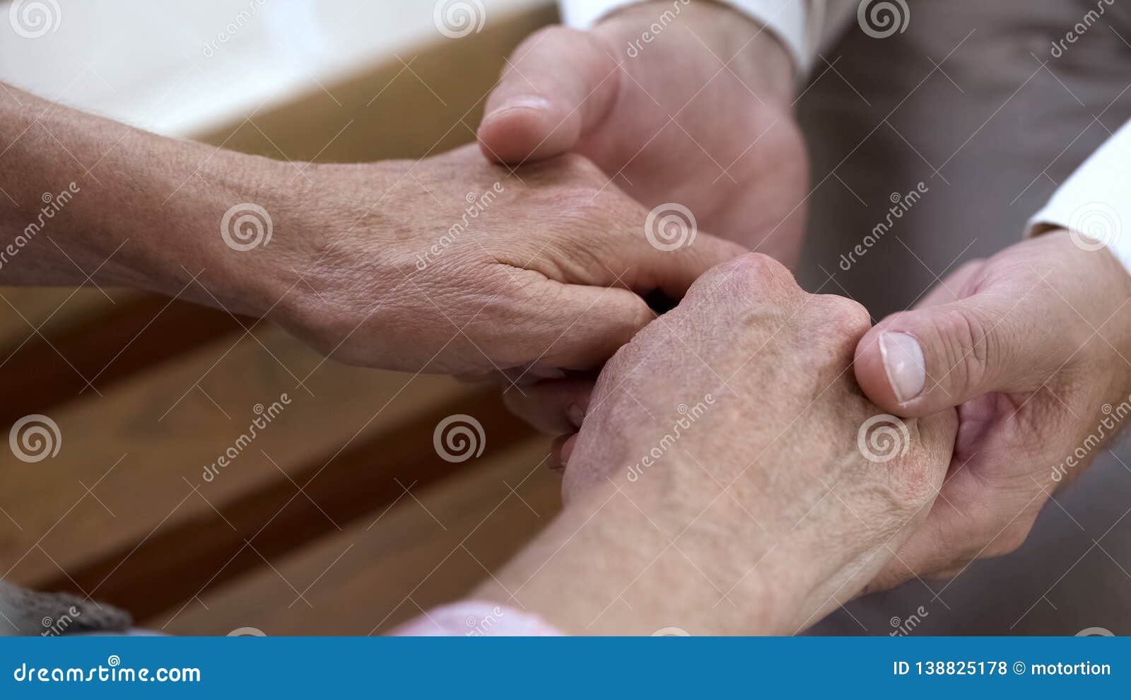 true love through hard times, man holding old female hands, support and care