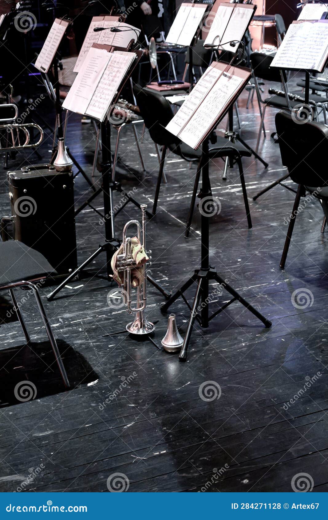 Trumpet and Mute Stand on Stage during an Intermission in a Theater