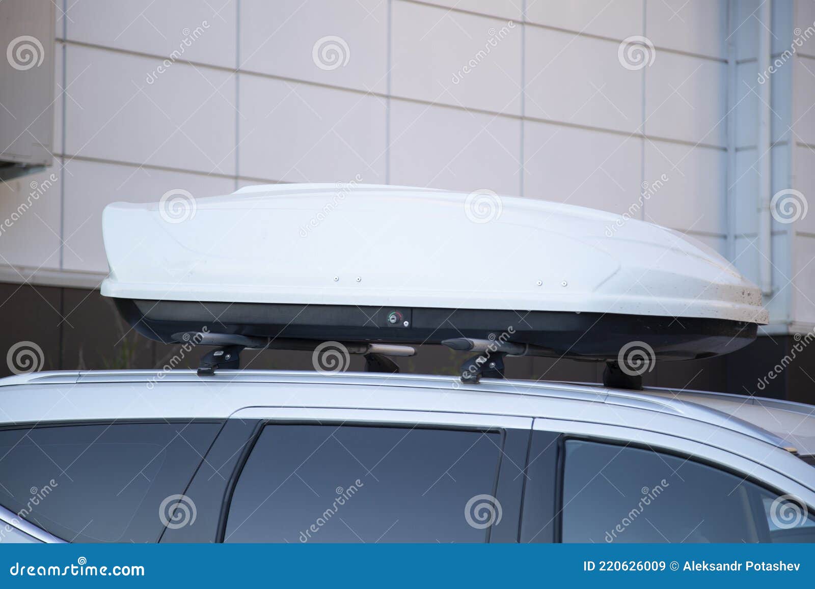 The Trunk is Closed on the Roof of the Car. Additional Equipment for