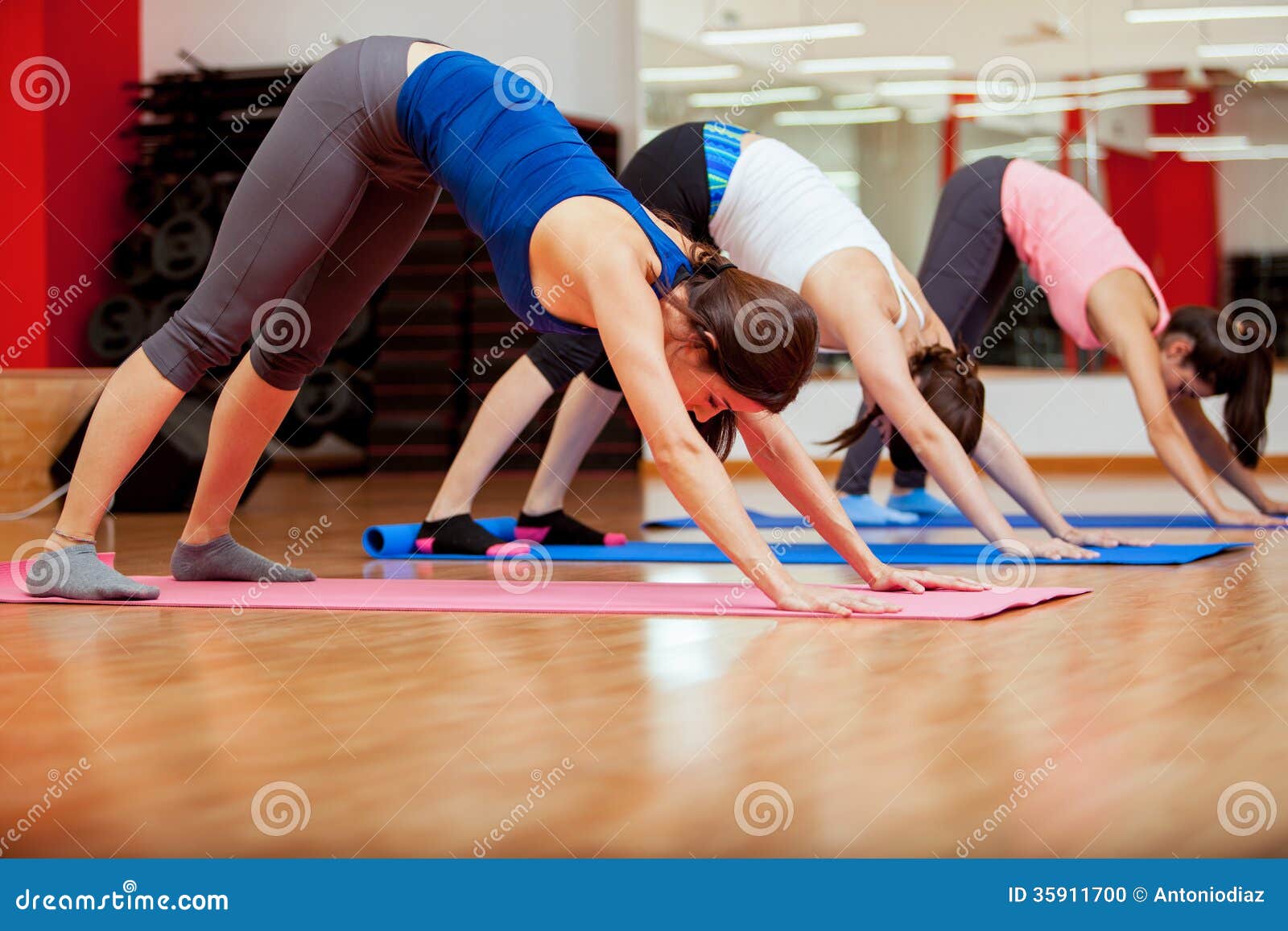 Trying A New Pose During Yoga Class Stock Photo - Image of copy, people