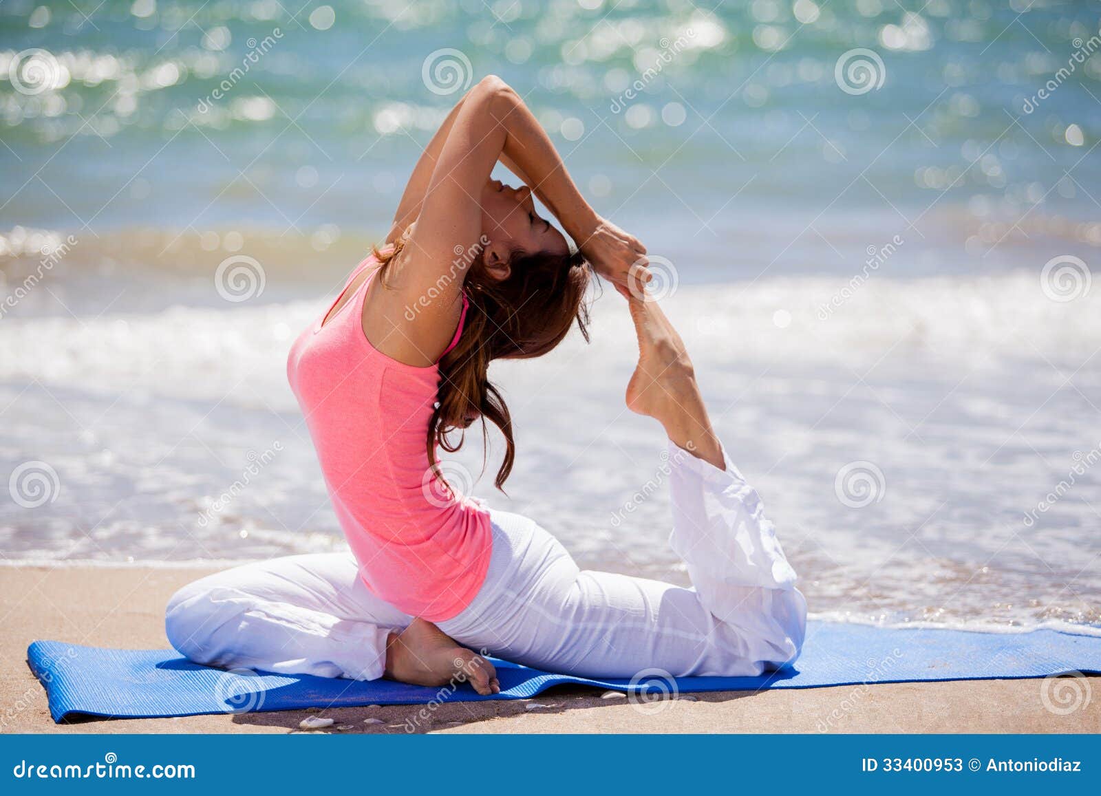 Trying Some Yoga Poses at the Beach Stock Image - Image of