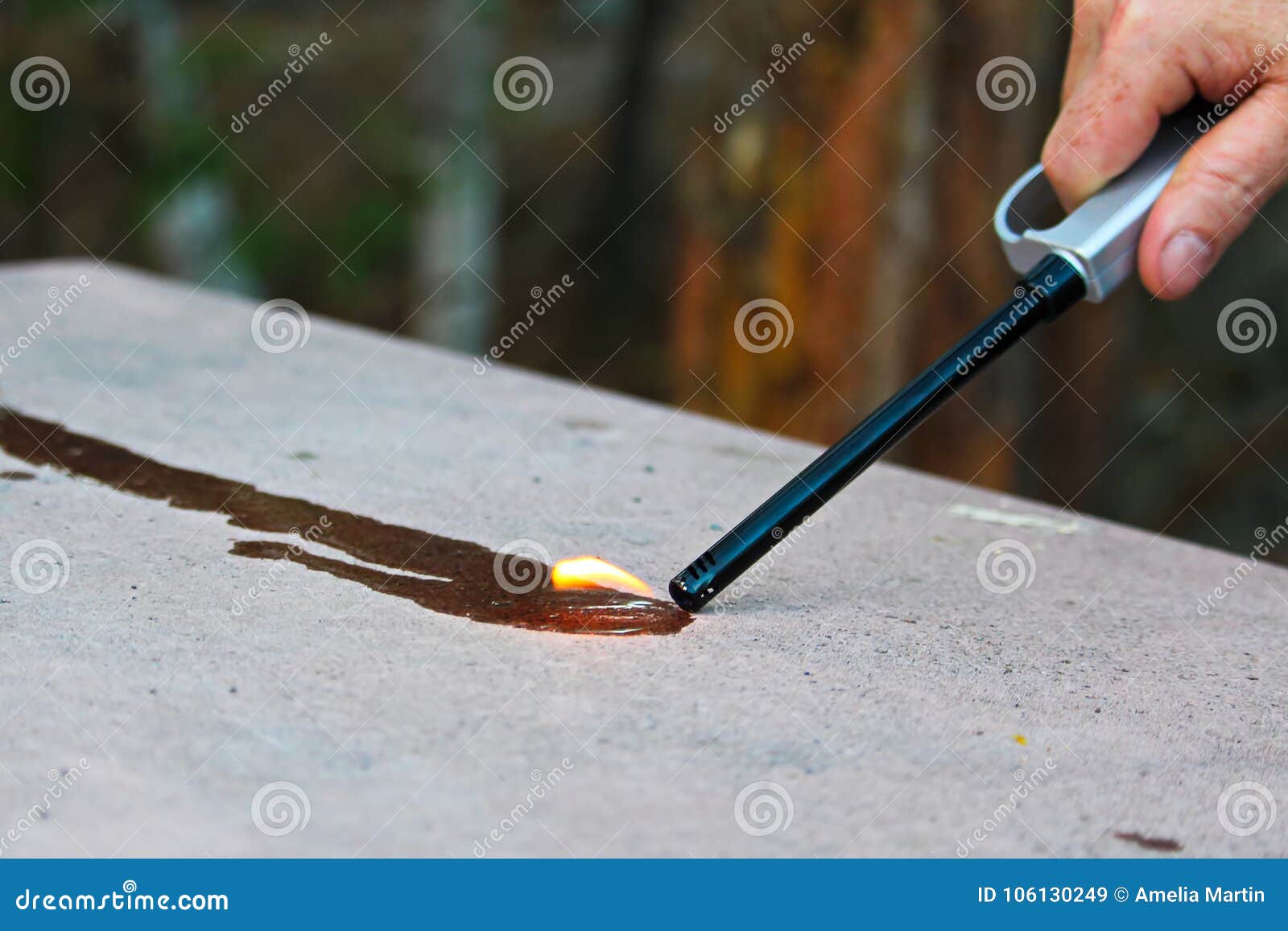 trying to light fluid on fire with a butane lighter