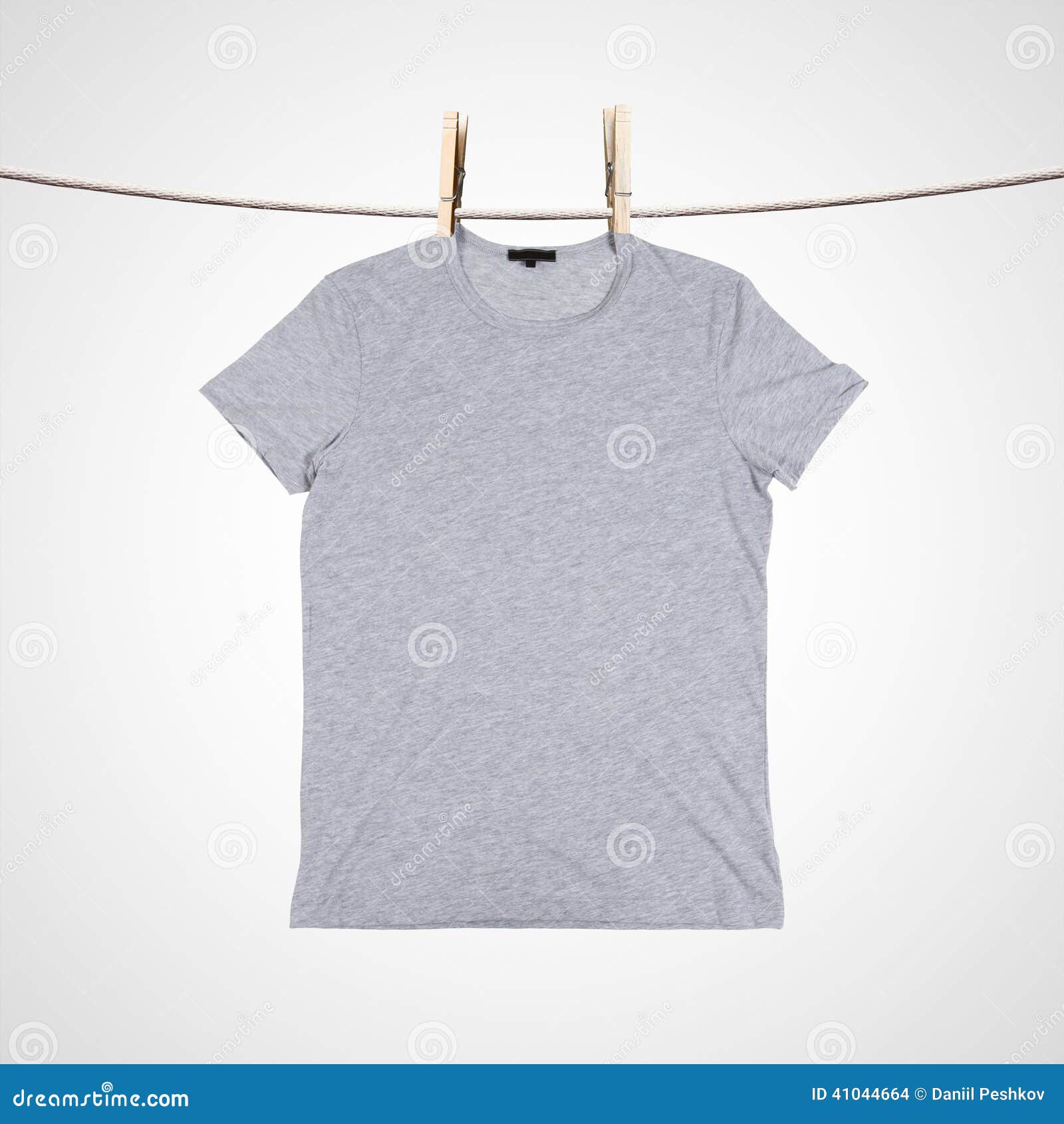 Tshirt on clothesline stock photo. Image of outfit, cotton - 41044664