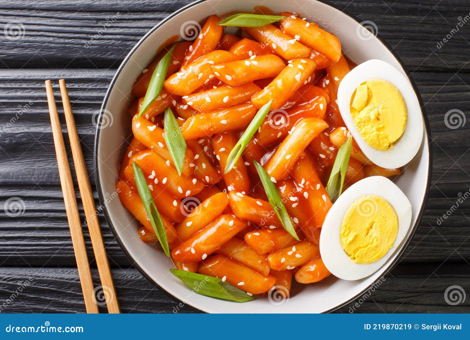 https://thumbs.dreamstime.com/z/tteokbokki-also-spelled-ddukbokki-ddeokbokki-dukbokki-topokki-beloved-korean-rice-cake-dish-close-up-bowl-table-219870219.jpg