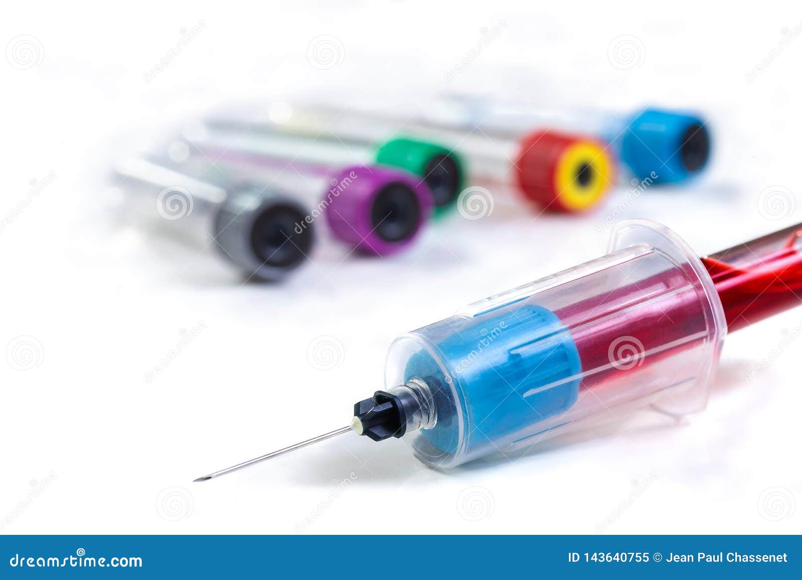Tube Adapter with Needle and Tubes Blood Extraction in the Background