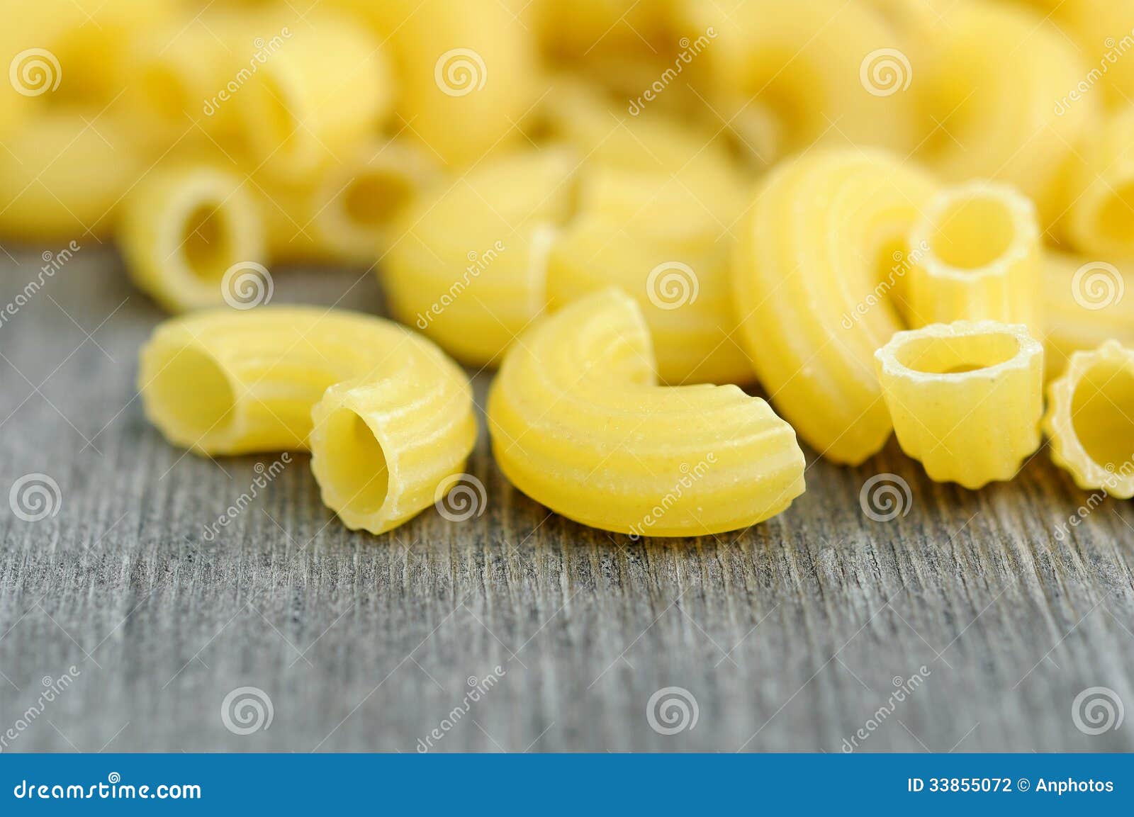 Tube pasta stock photo. Image of cook, shaped, wooden 33855072