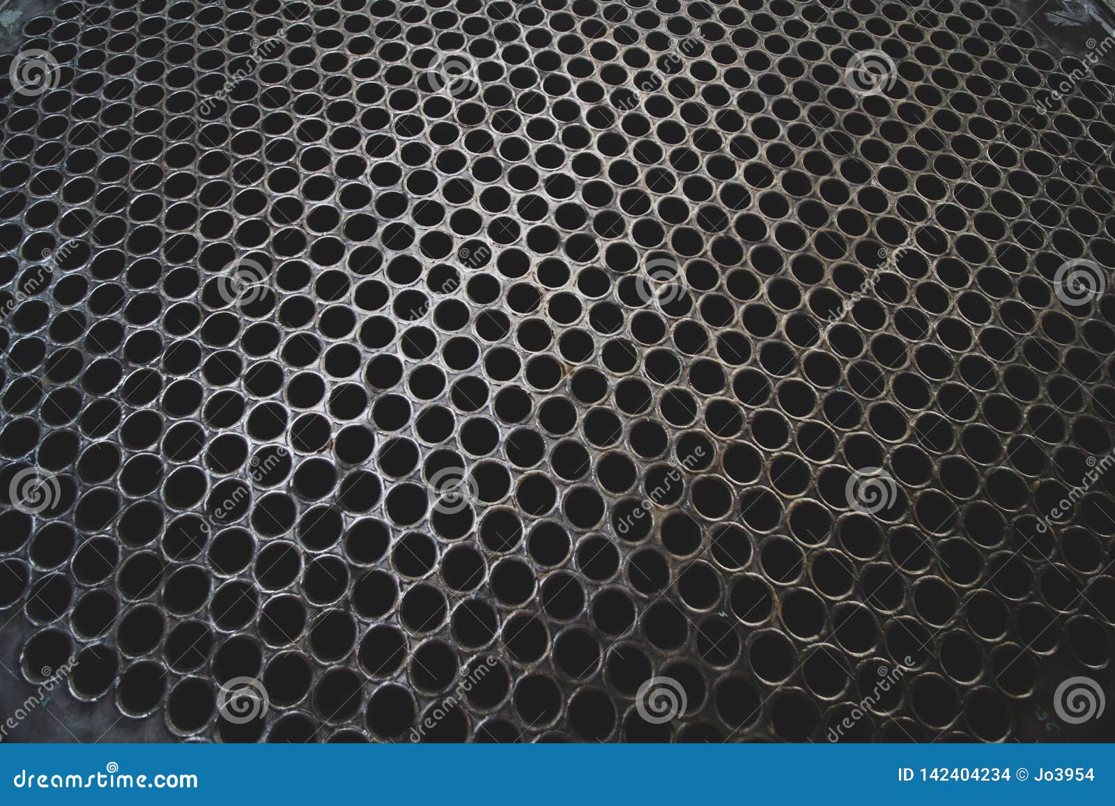 tube sheet of the heat exchanger, the water heater in the boiler as background at fabrication industrial