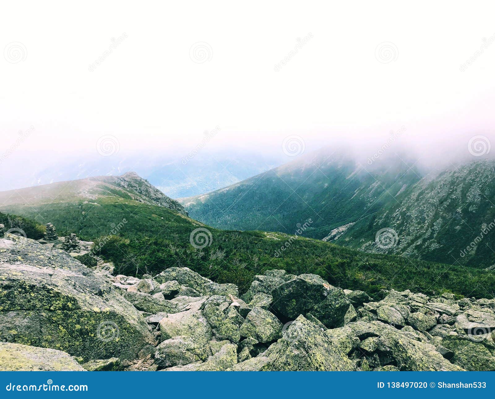 tuckerman ravine trail mountain range with fog