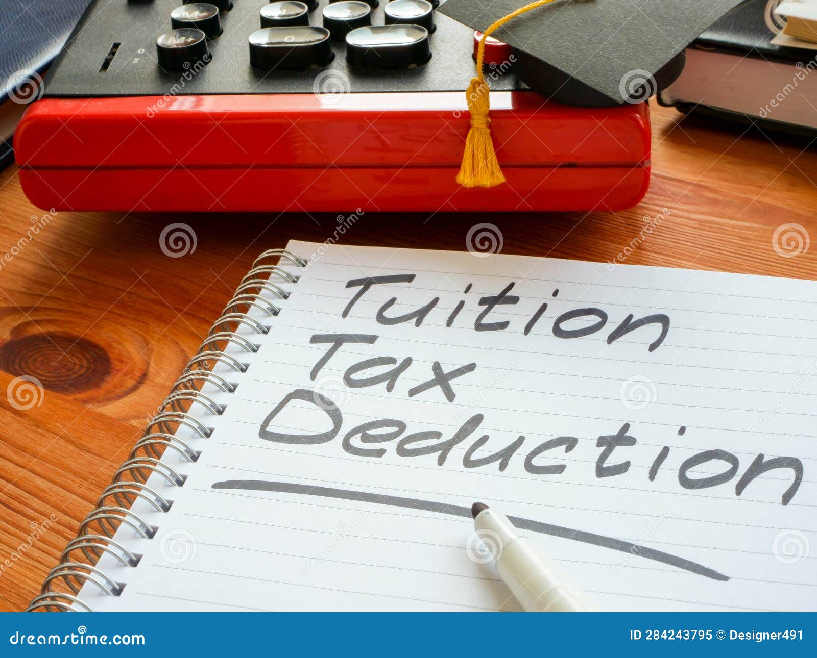 Tuition Tax Deduction Mark in the Notebook. Stock Image Image of