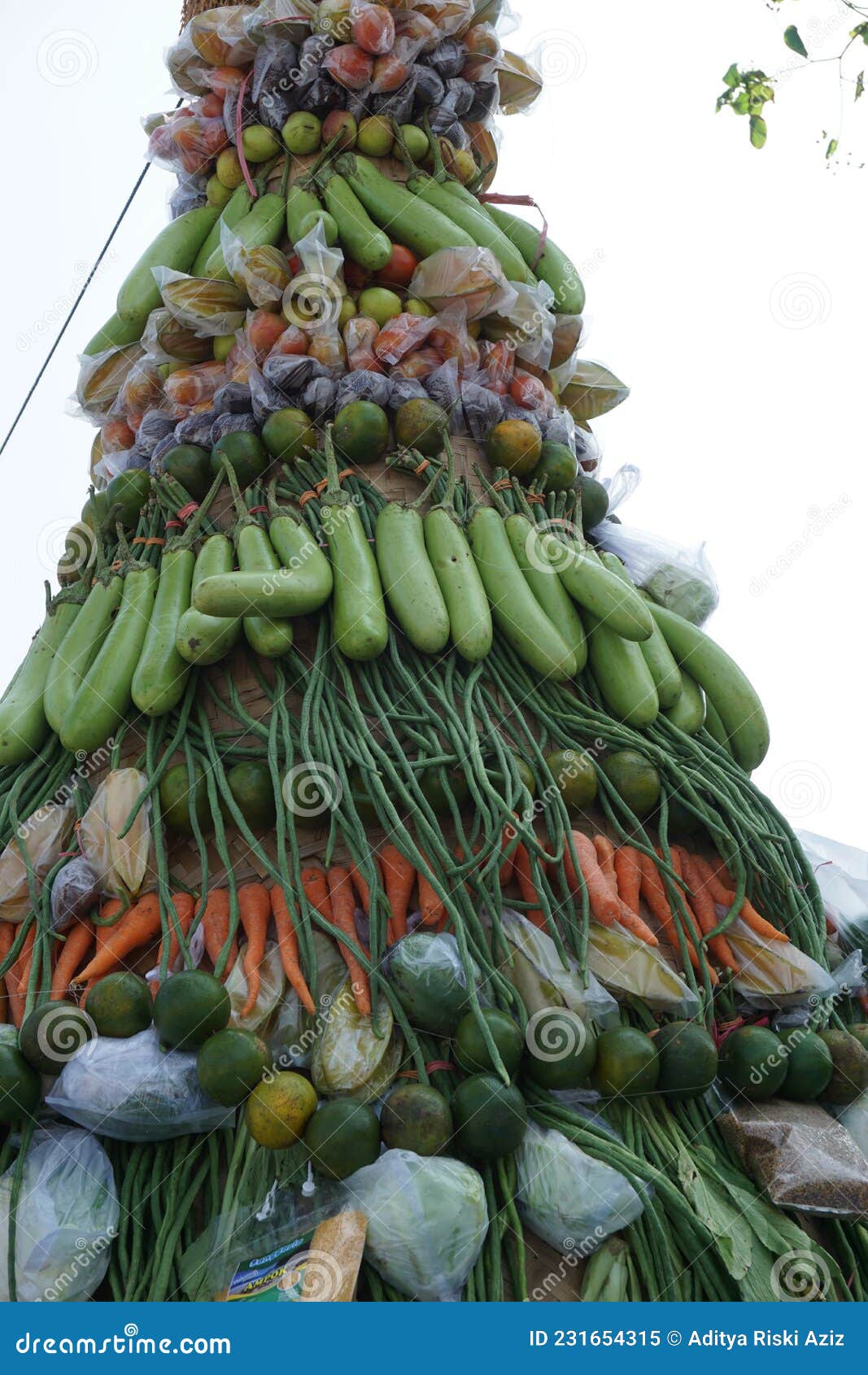 tumpeng sayur vegetable cone at the ceremony of sedekah bumi javanese thanksgiving in sanggar beach. tumpeng sayur contains va