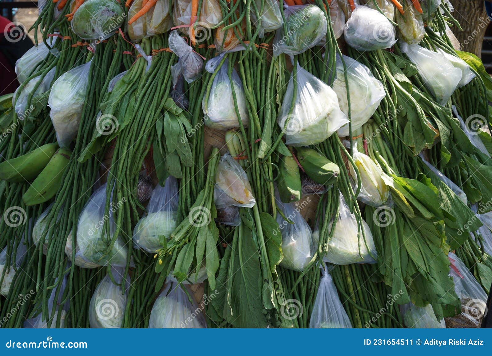 tumpeng sayur vegetable cone at the ceremony of sedekah bumi javanese thanksgiving in sanggar beach. tumpeng sayur contains va