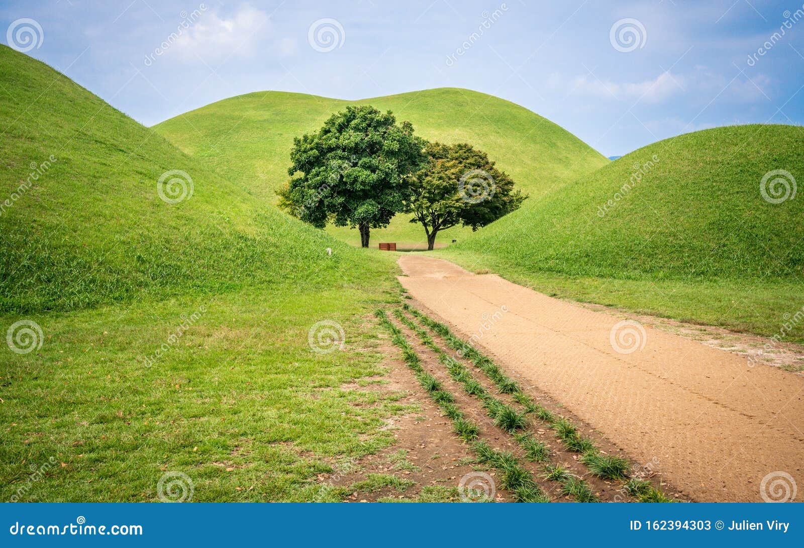 tumuli park or daereungwon tomb complex scenic view with several tumulus and green trees in middle gyeongju south korea