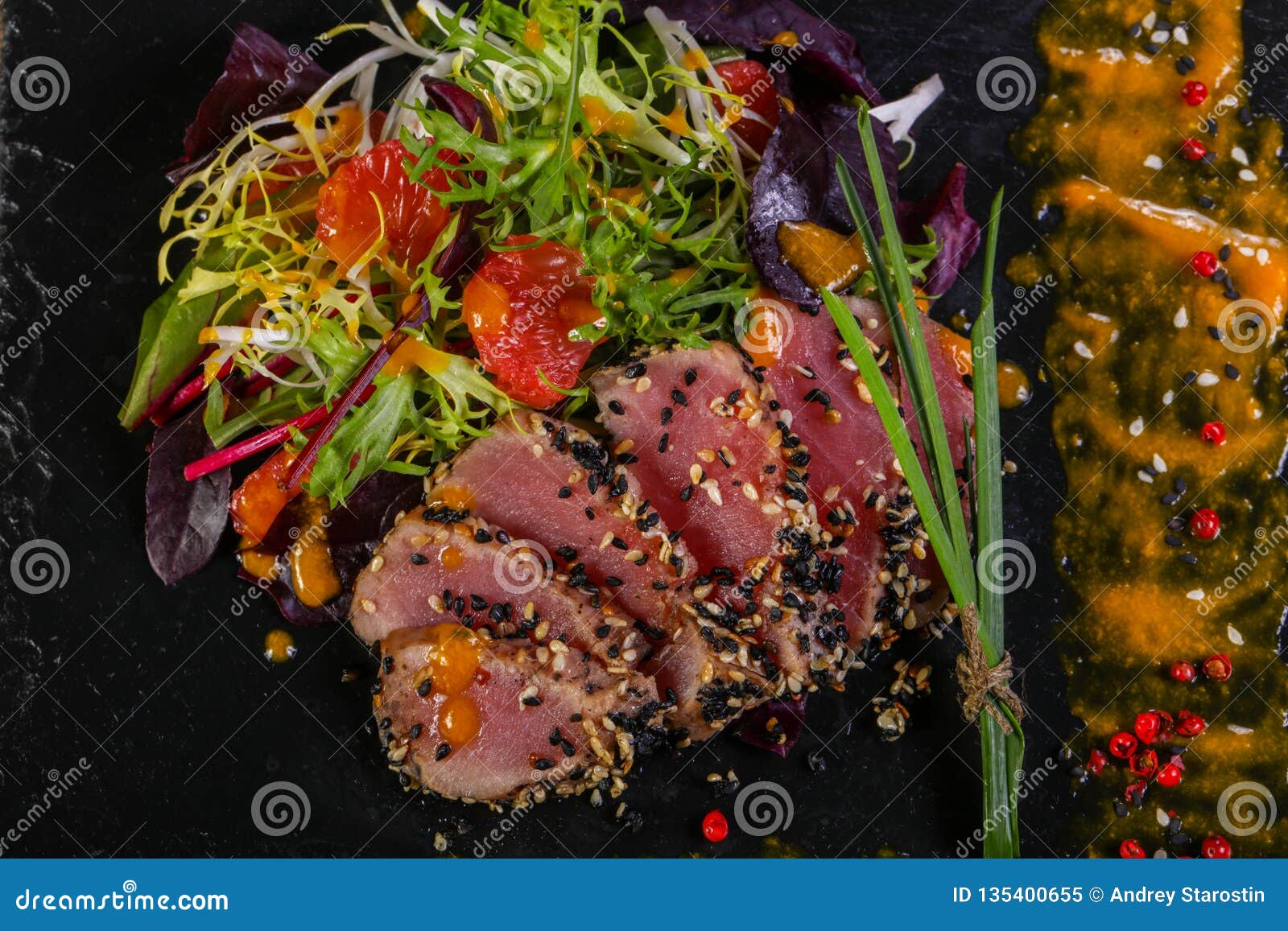 Tuna carpaccio with sauce stock image. Image of lettuce 135400655