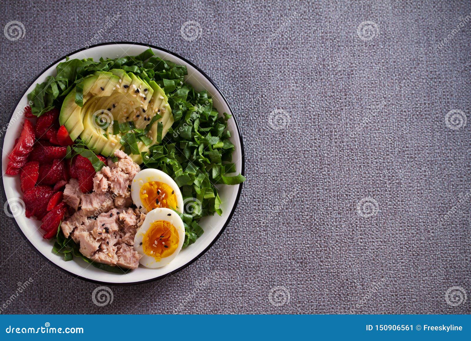 Tuna Strawberry Avocado Egg and Spinach Salad in Bowl - Healthy Food