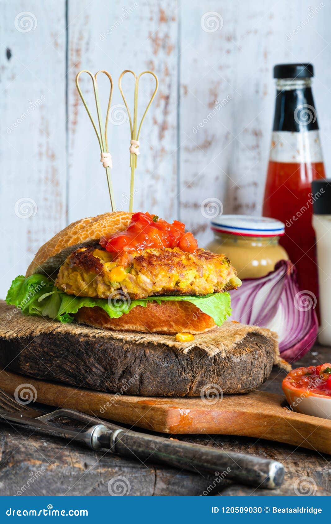 Tuna and sweetcorn burger stock photo. Image of meal 120509030