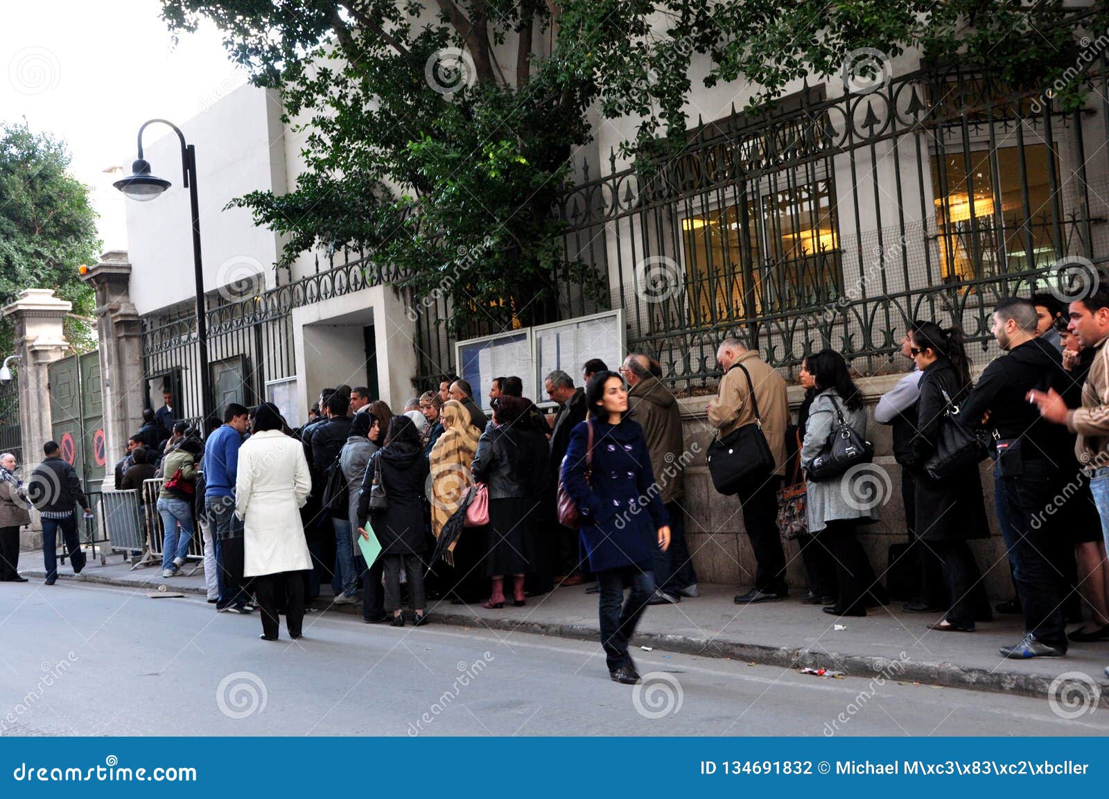 Tunesian People Queing in Front of the French Embassy - Waiting for a ...