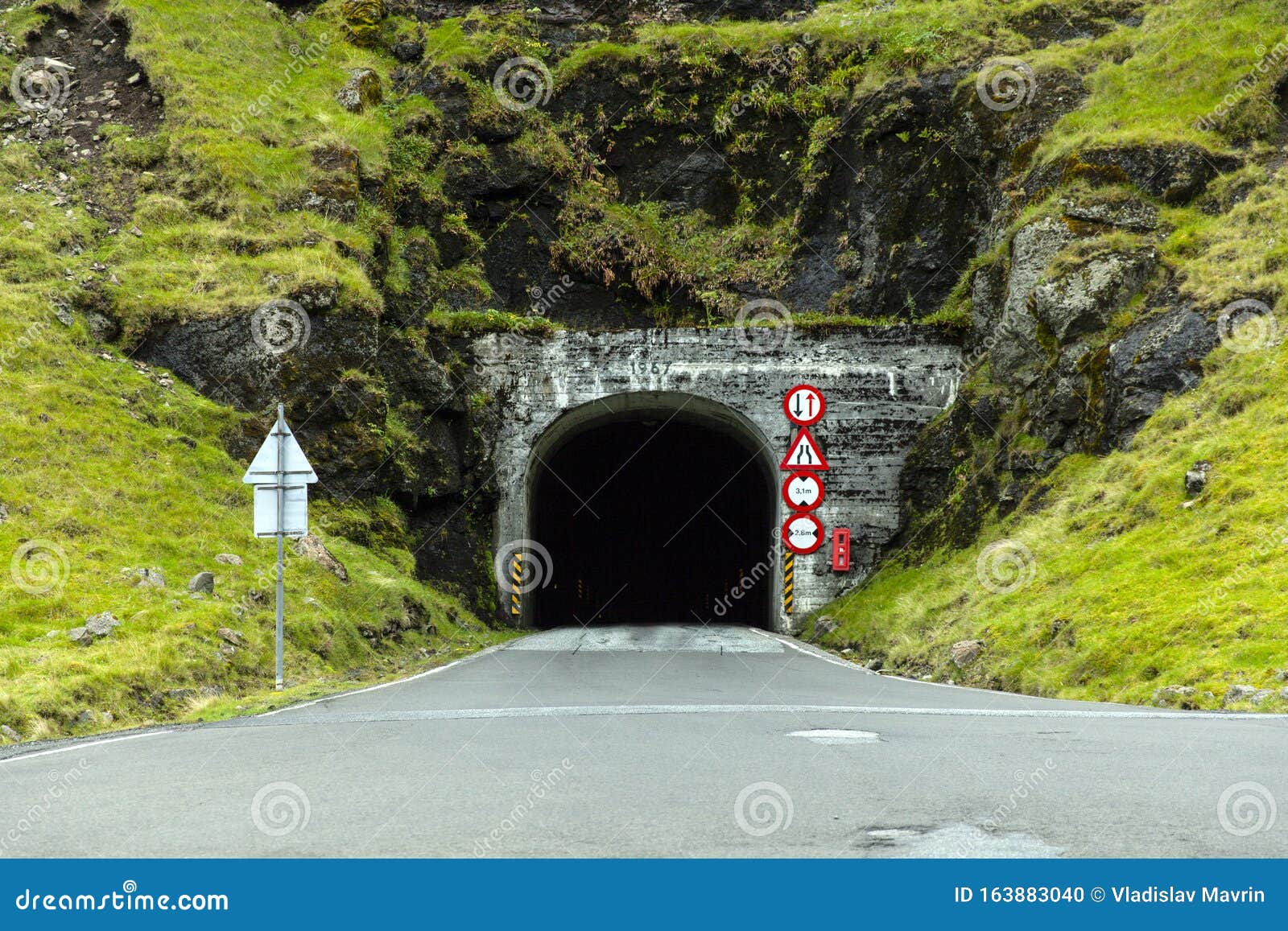 Tunnel in Faroe Islands stock photo. Image of mountain 163883040