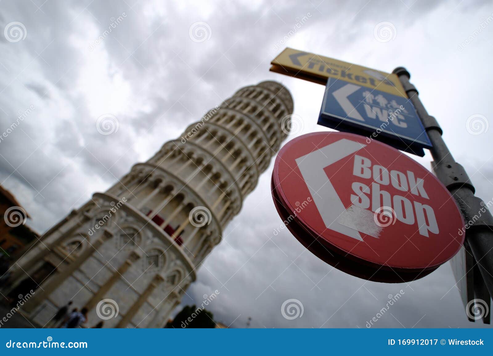 turism in italy, pissa tower signs and posts