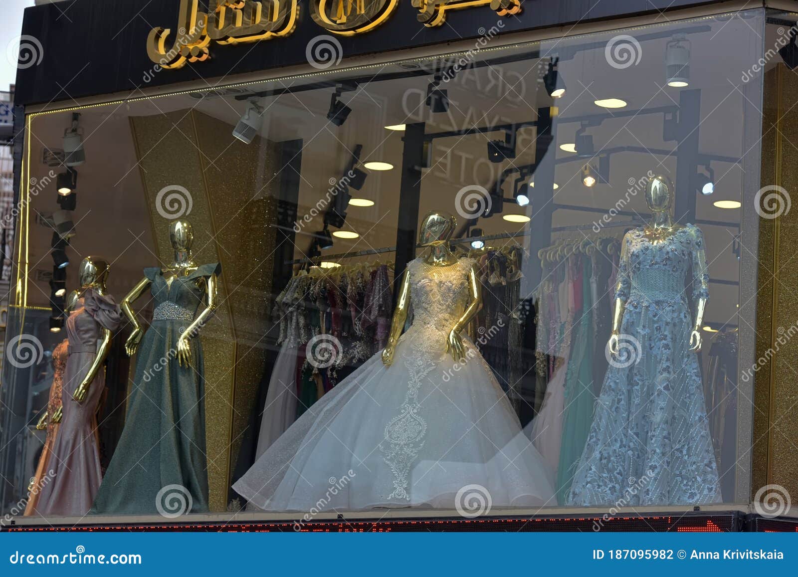 Long Elegant and Wedding Dresses in a Shop Window Editorial ...
