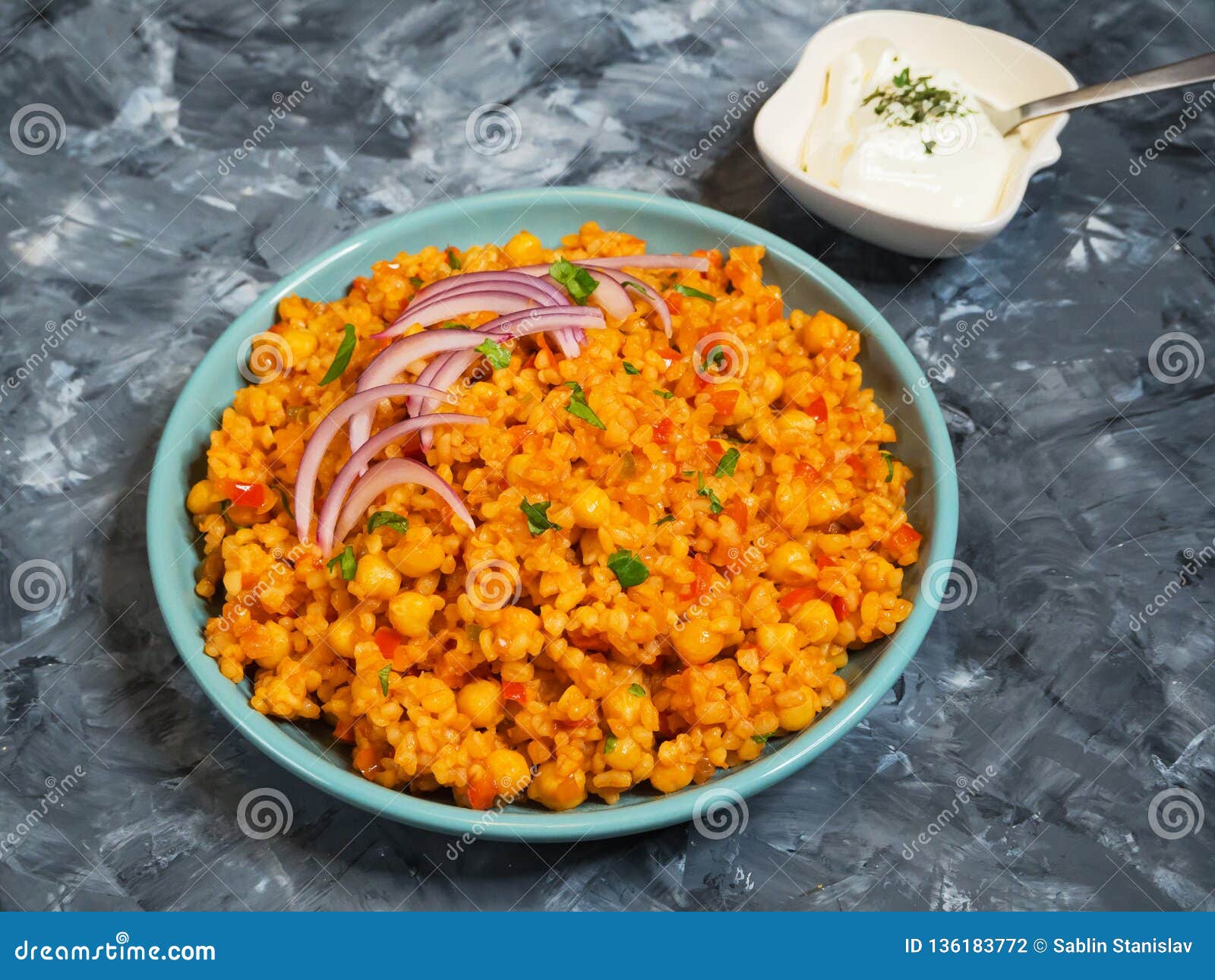 Turkish Bulgur Pilaf with Chickpeas and Tomatoes. Stock Photo Image
