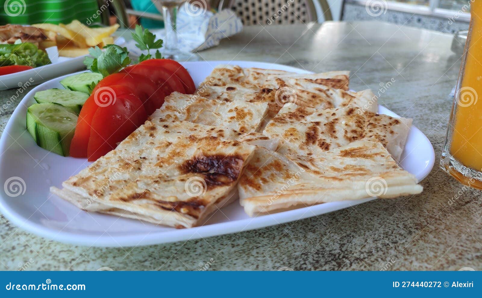 Turkish Gozleme Flatbread with Cheese and Vegetables Stock Photo