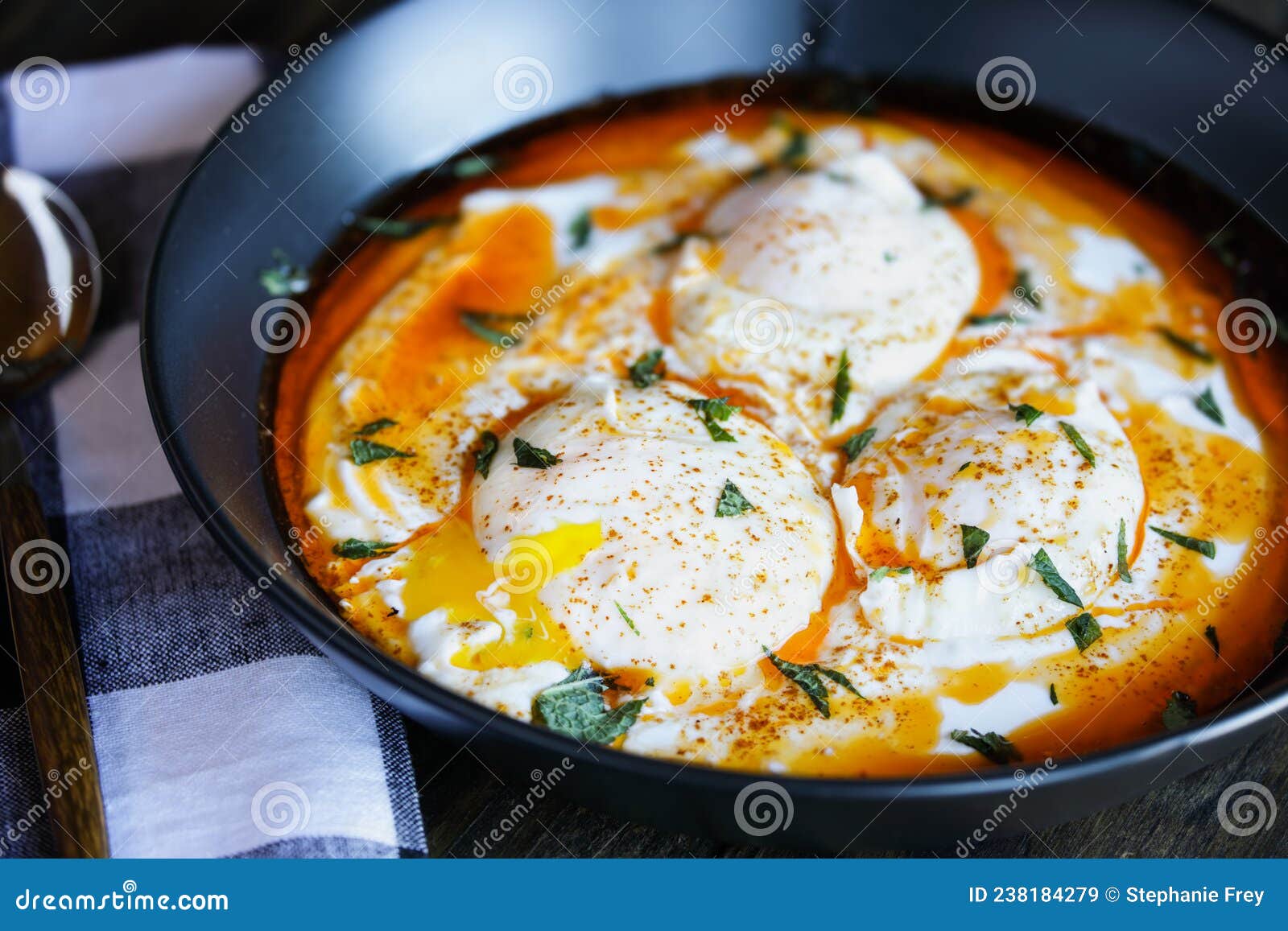 turkish poached eggs or cilbir with mint