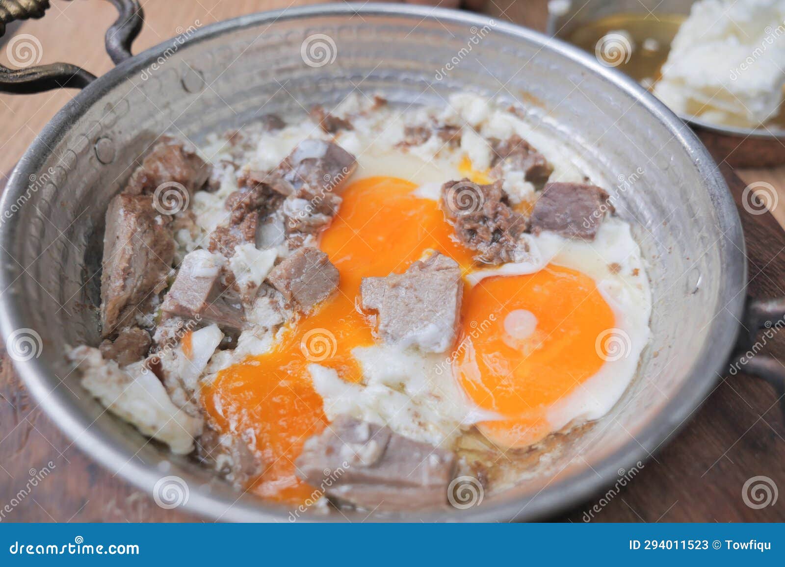 Turkish Scrambled Eggs with Roasted Meat in Copper Pan Stock Image