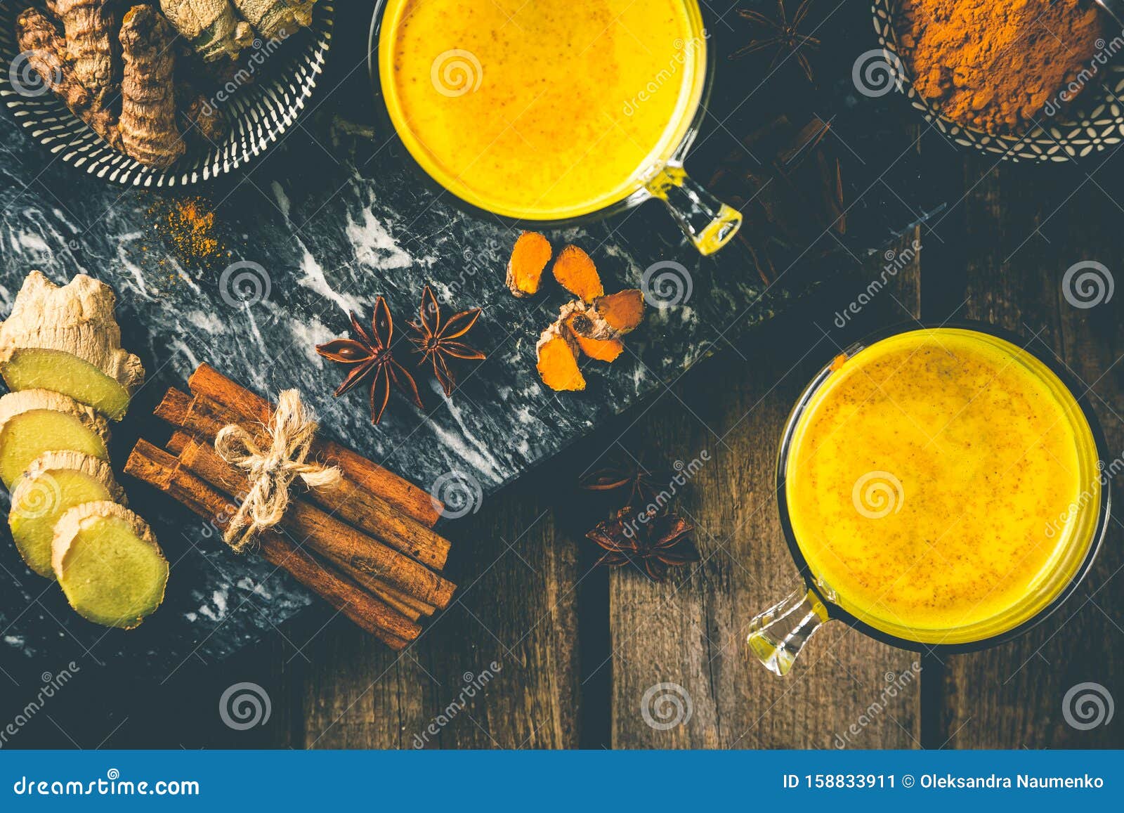 Turmeric Golden Milk and Ingredients on Wood Background Stock Image ...