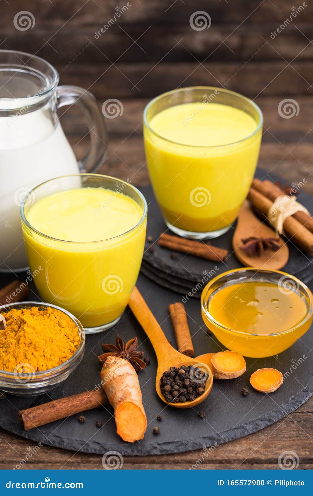 Turmeric Golden Milk Latte with Honey and Cinnamon Stock Photo - Image ...