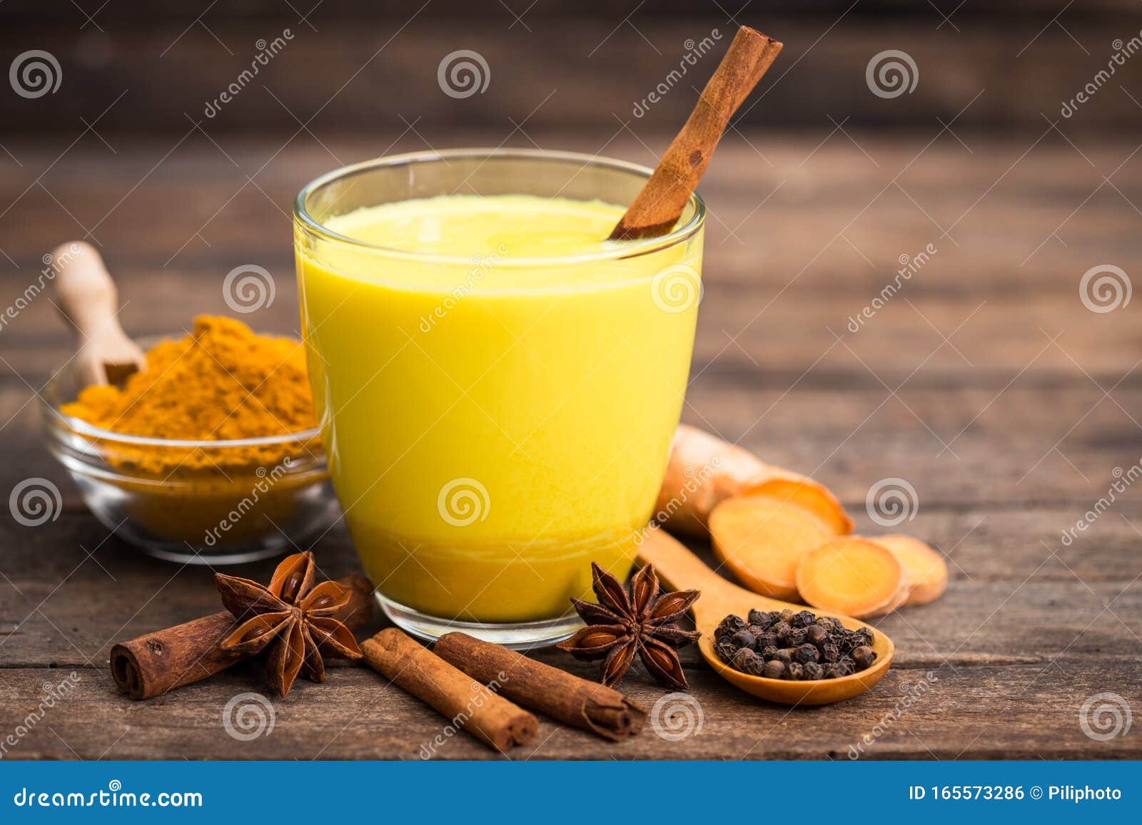 Turmeric Golden Milk Latte with Honey and Cinnamon Stock Photo - Image ...