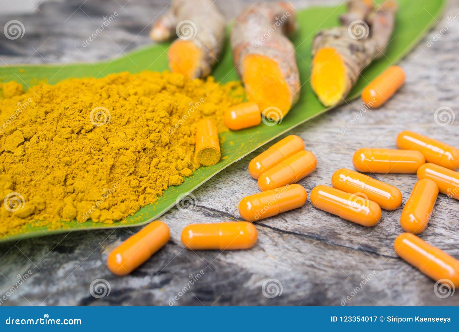 turmeric powder ,capsules , roots and leaf, curcumin herb medicine